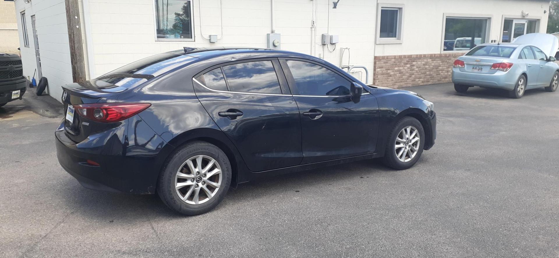 2014 Mazda MAZDA3 i Grand Touring AT 4-Door (3MZBM1W70EM) with an 2.0L L4 DOHC 16V engine, 6A transmission, located at 2015 Cambell Street, Rapid City, SD, 57701, (605) 342-8326, 44.066433, -103.191772 - CARFAX AVAILABLE - Photo#2