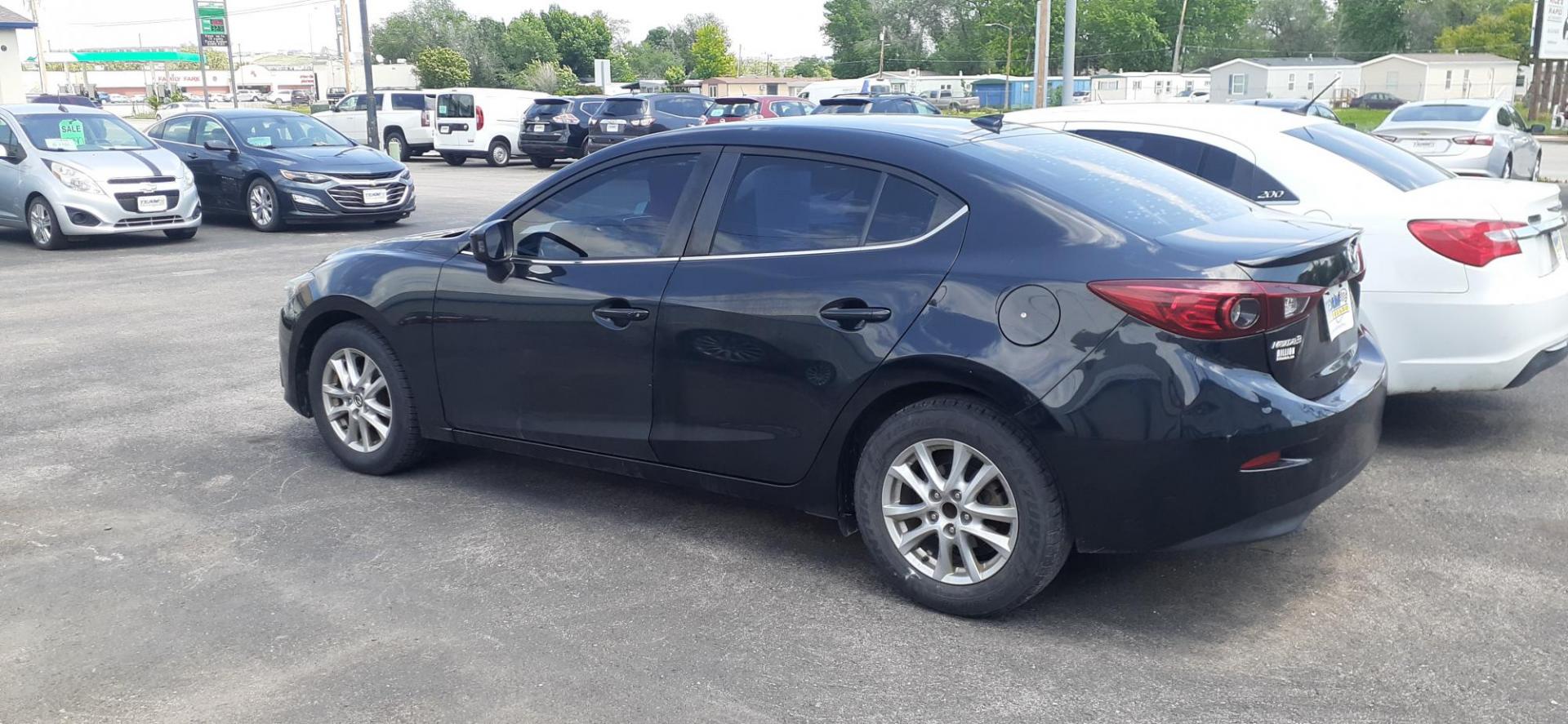 2014 Mazda MAZDA3 i Grand Touring AT 4-Door (3MZBM1W70EM) with an 2.0L L4 DOHC 16V engine, 6A transmission, located at 2015 Cambell Street, Rapid City, SD, 57701, (605) 342-8326, 44.066433, -103.191772 - CARFAX AVAILABLE - Photo#1