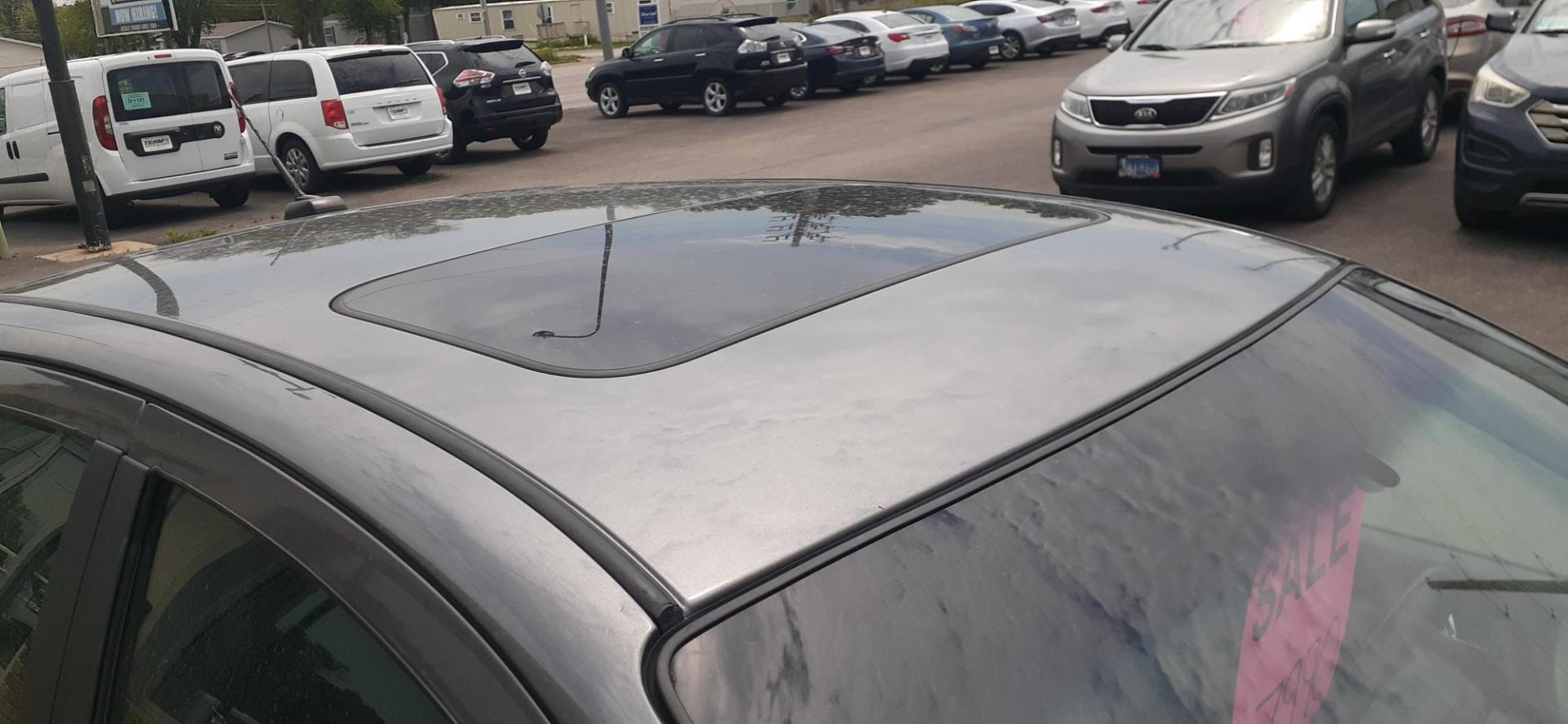 2011 Ford Focus SEL Sedan (1FAHP3HN2BW) with an 2.0L L4 DOHC 16V engine, located at 2015 Cambell Street, Rapid City, SD, 57701, (605) 342-8326, 44.066433, -103.191772 - CARFAX AVAILABLE - Photo#5