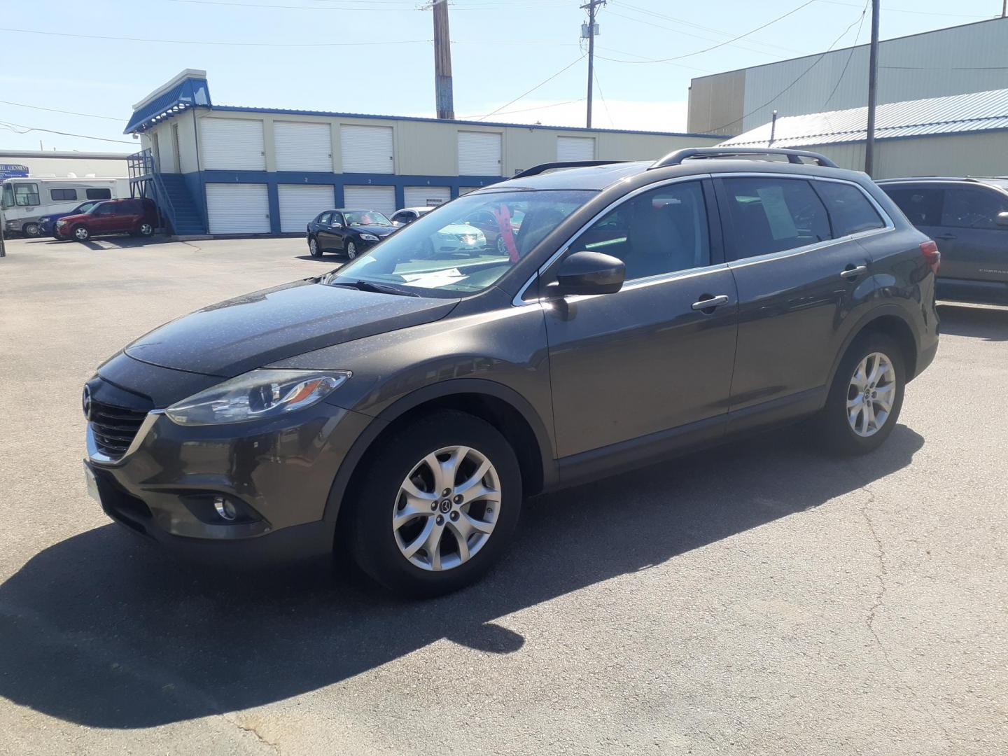 2015 Mazda CX-9 Touring AWD (JM3TB3CA1F0) with an 3.7L V6 DOHC 24V engine, 6-Speed Automatic transmission, located at 2015 Cambell Street, Rapid City, SD, 57701, (605) 342-8326, 44.066433, -103.191772 - CARFAX AVAILABLE - Photo#1