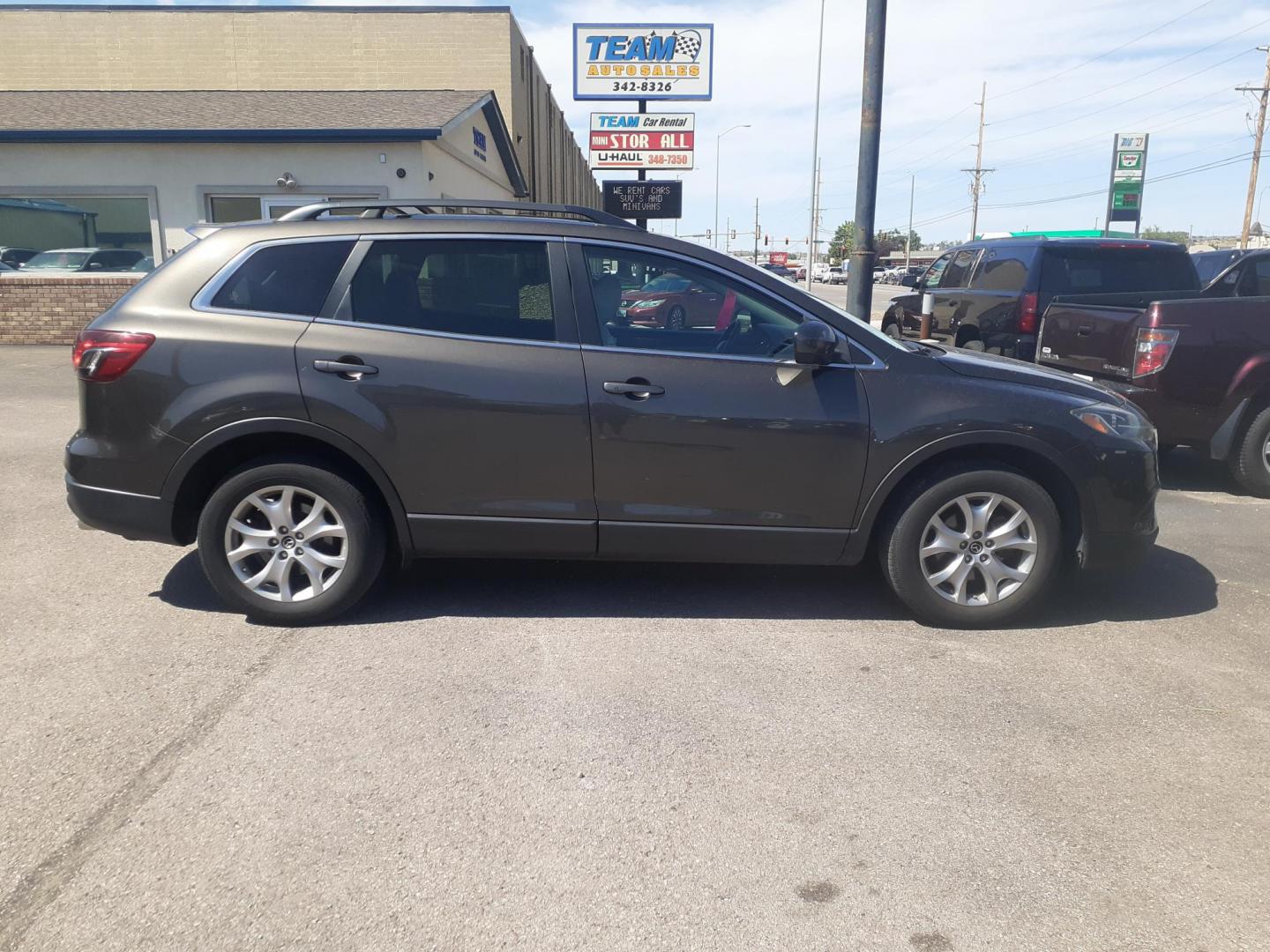 2015 Mazda CX-9 Touring AWD (JM3TB3CA1F0) with an 3.7L V6 DOHC 24V engine, 6-Speed Automatic transmission, located at 2015 Cambell Street, Rapid City, SD, 57701, (605) 342-8326, 44.066433, -103.191772 - CARFAX AVAILABLE - Photo#4