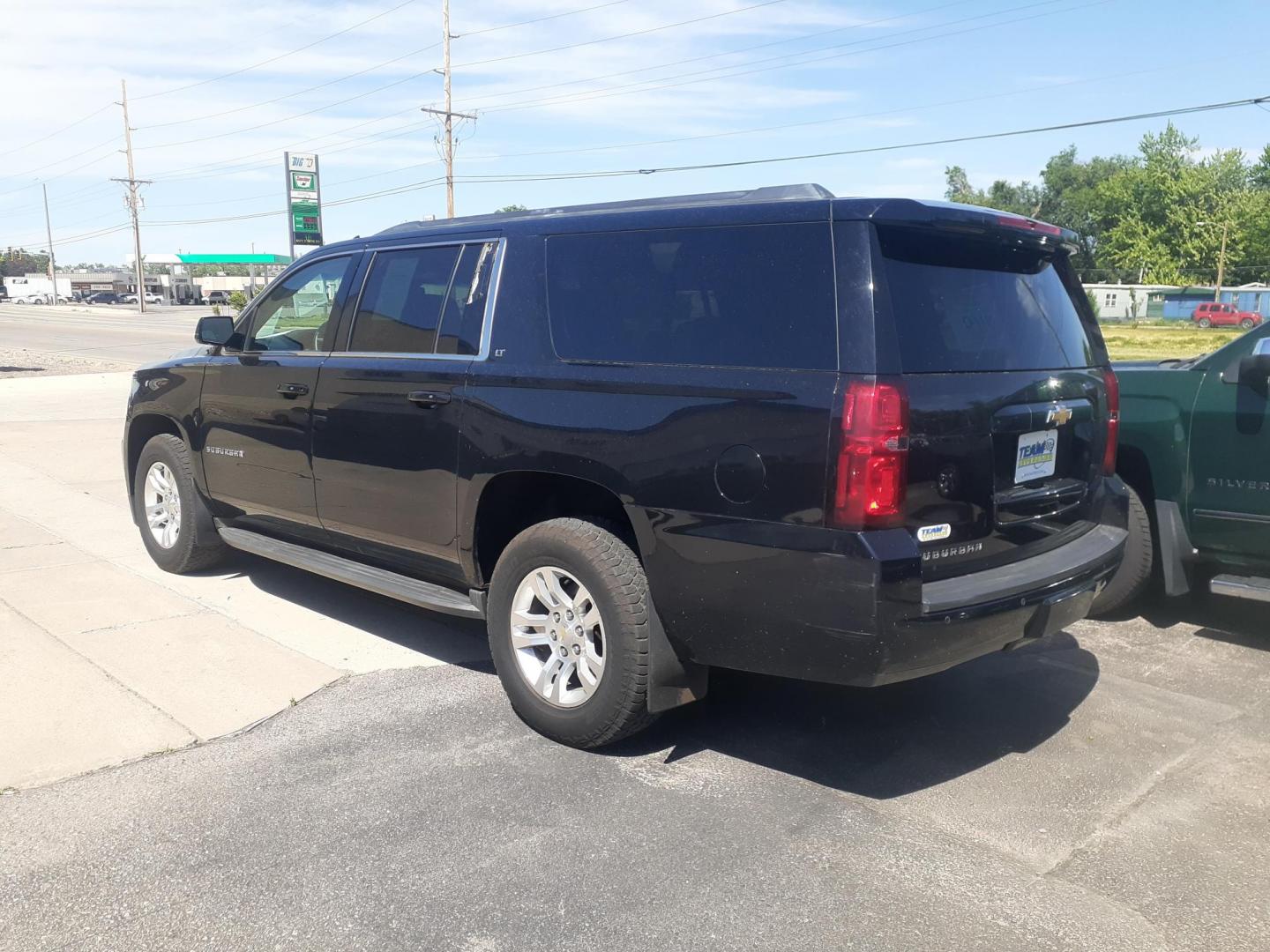 2015 Chevrolet Suburban LT 1500 4WD (1GNSKJKC0FR) with an 5.3L V8 OHV 16V engine, 6-Speed Automatic transmission, located at 2015 Cambell Street, Rapid City, SD, 57701, (605) 342-8326, 44.066433, -103.191772 - CARFAX AVAILABLE - Photo#3