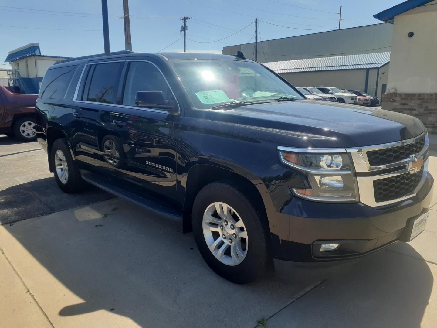 2015 Chevrolet Suburban LT 1500 4WD (1GNSKJKC0FR) with an 5.3L V8 OHV 16V engine, 6-Speed Automatic transmission, located at 2015 Cambell Street, Rapid City, SD, 57701, (605) 342-8326, 44.066433, -103.191772 - CARFAX AVAILABLE - Photo#4