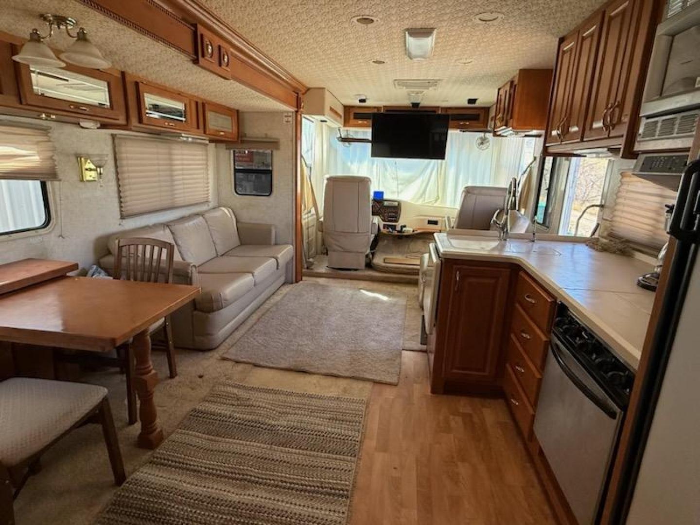 2003 Workhorse W22 Motorhome (5B4MP67G133) with an 8.1L V8 OHV 16V engine, located at 2015 Cambell Street, Rapid City, SD, 57701, (605) 342-8326, 44.066433, -103.191772 - 8.1 GAS MOTOR ALLISON TRANSMISSION ONBOARD GENERATOR 3 SLIDE OUTS QUEEN BED IN BACK WITH NEW MATTRESSES NEW TIRES 2 NEW BATTERIES . - Photo#2
