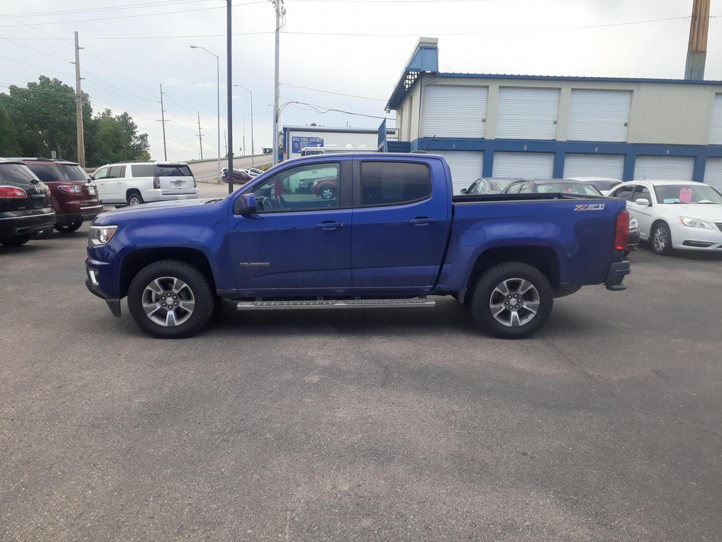 2016 Chevrolet Colorado Z71 Crew Cab 4WD Long Box (1GCGTDE36G1) with an 3.6L V6 DOHC 24V GAS engine, 6A transmission, located at 2015 Cambell Street, Rapid City, SD, 57701, (605) 342-8326, 44.066433, -103.191772 - CARFAX AVAILABLE - Photo#0