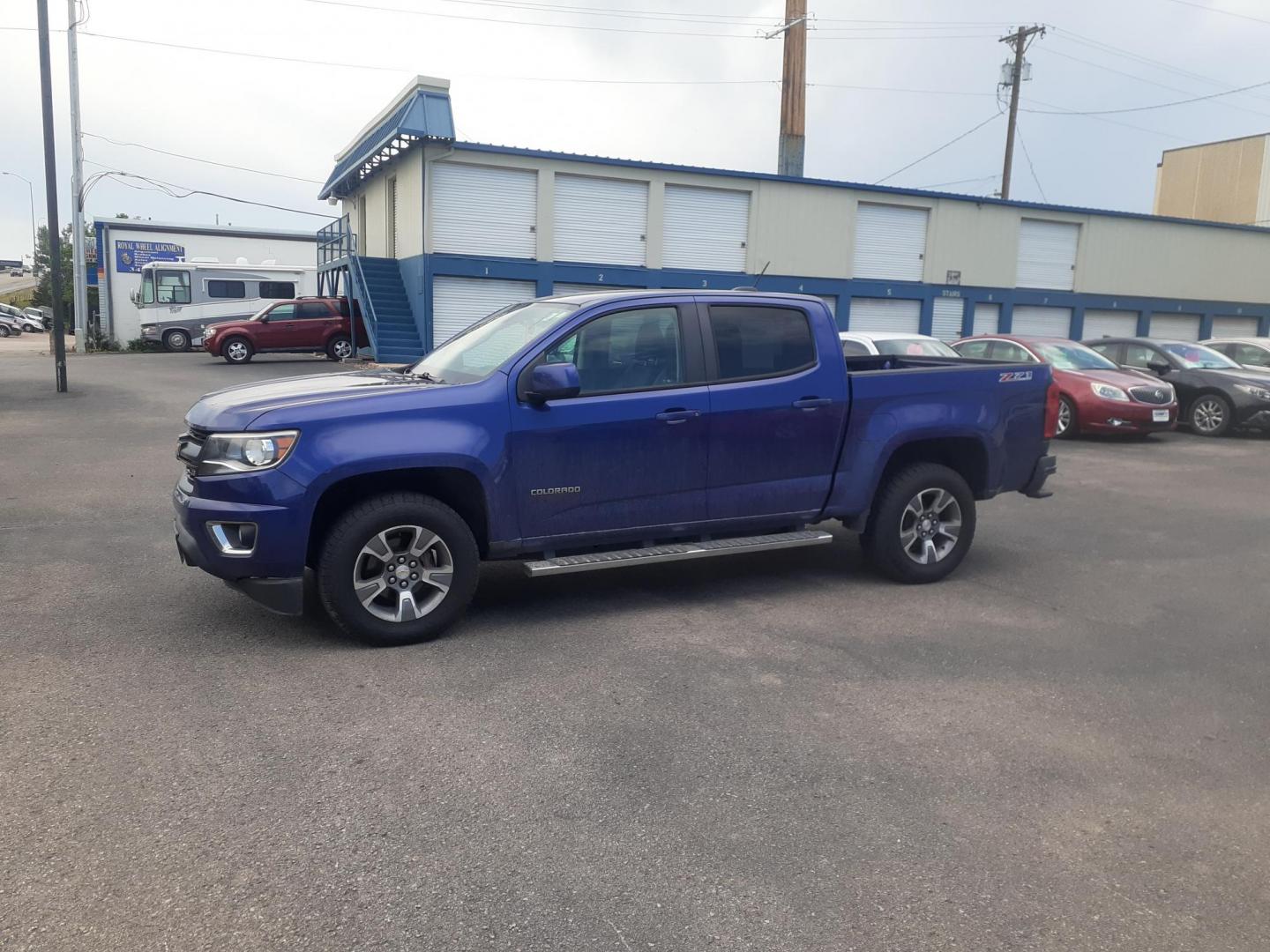 2016 Chevrolet Colorado Z71 Crew Cab 4WD Long Box (1GCGTDE36G1) with an 3.6L V6 DOHC 24V GAS engine, 6A transmission, located at 2015 Cambell Street, Rapid City, SD, 57701, (605) 342-8326, 44.066433, -103.191772 - CARFAX AVAILABLE - Photo#1
