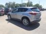 2013 Mazda CX-5 Grand Touring AWD (JM3KE4DEXD0) , 6-Speed Automatic transmission, located at 2015 Cambell Street, Rapid City, SD, 57701, (605) 342-8326, 44.066433, -103.191772 - CARFAX AVAILABLE - Photo#2