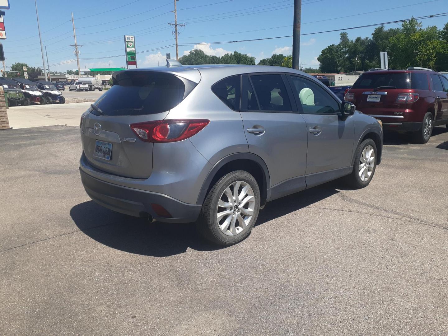 2013 Mazda CX-5 Grand Touring AWD (JM3KE4DEXD0) , 6-Speed Automatic transmission, located at 2015 Cambell Street, Rapid City, SD, 57701, (605) 342-8326, 44.066433, -103.191772 - CARFAX AVAILABLE - Photo#3
