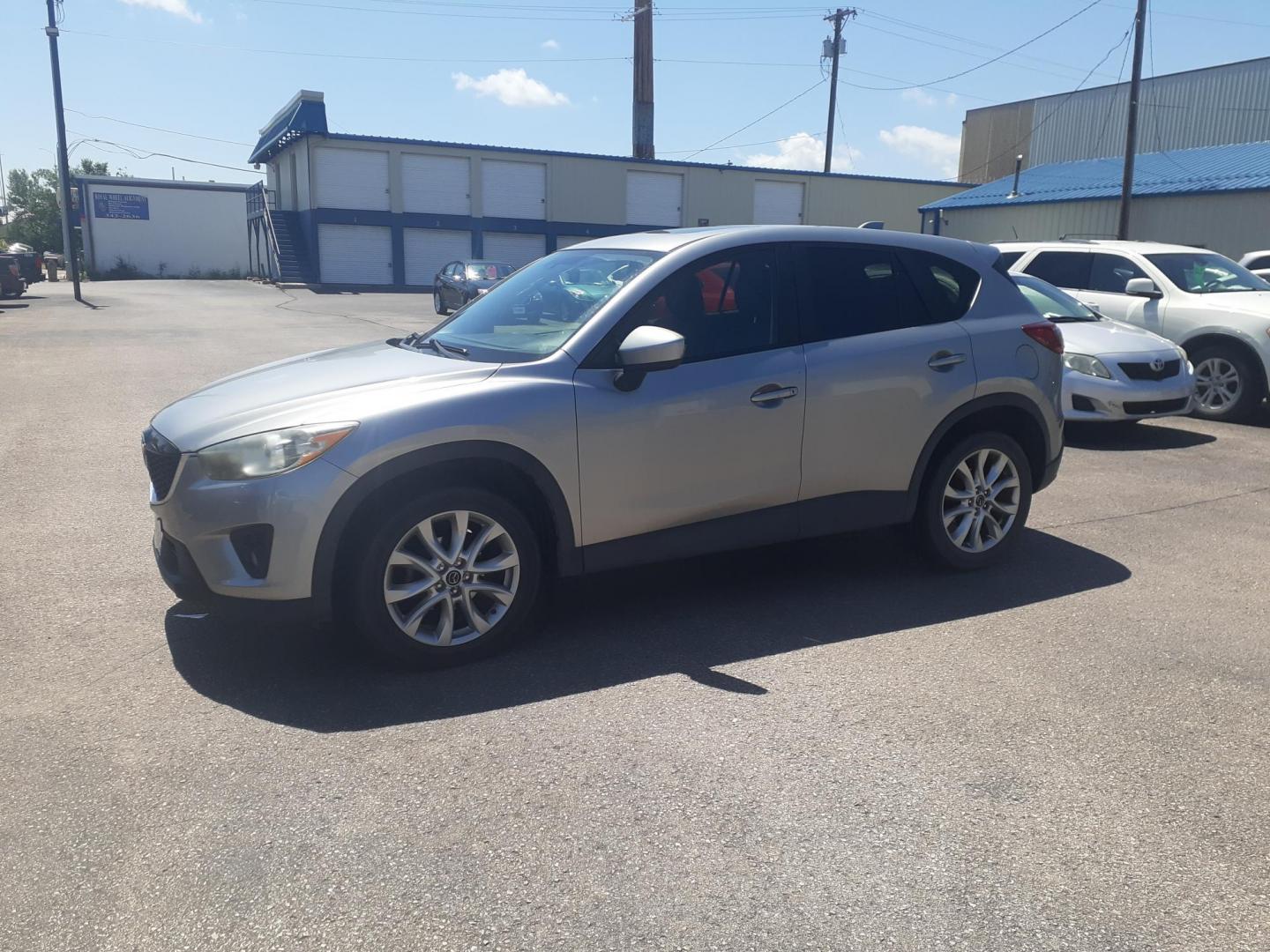 2013 Mazda CX-5 Grand Touring AWD (JM3KE4DEXD0) , 6-Speed Automatic transmission, located at 2015 Cambell Street, Rapid City, SD, 57701, (605) 342-8326, 44.066433, -103.191772 - CARFAX AVAILABLE - Photo#1