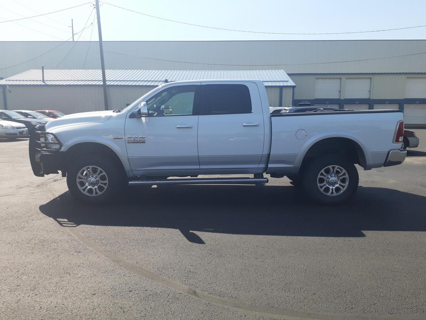 2017 RAM 2500 Laramie Crew Cab SWB 4WD (3C6UR5FJ7HG) with an 6.4L V8 engine, 6A transmission, located at 2015 Cambell Street, Rapid City, SD, 57701, (605) 342-8326, 44.066433, -103.191772 - CARFAX AVAILABLE - Photo#0