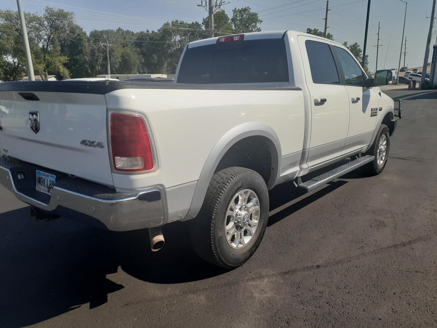 2017 RAM 2500 Laramie Crew Cab SWB 4WD (3C6UR5FJ7HG) with an 6.4L V8 engine, 6A transmission, located at 2015 Cambell Street, Rapid City, SD, 57701, (605) 342-8326, 44.066433, -103.191772 - CARFAX AVAILABLE - Photo#4