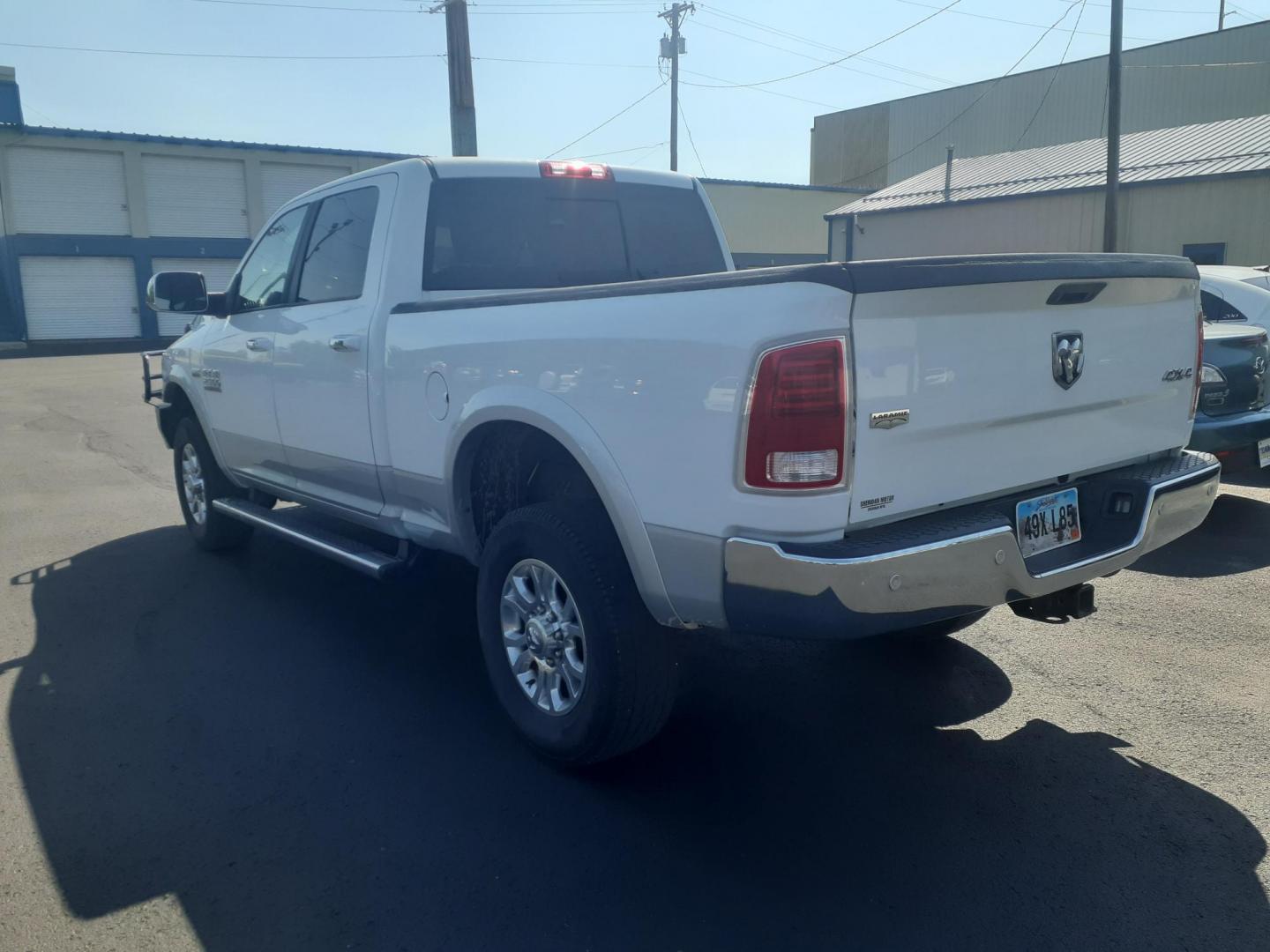2017 RAM 2500 Laramie Crew Cab SWB 4WD (3C6UR5FJ7HG) with an 6.4L V8 engine, 6A transmission, located at 2015 Cambell Street, Rapid City, SD, 57701, (605) 342-8326, 44.066433, -103.191772 - CARFAX AVAILABLE - Photo#2