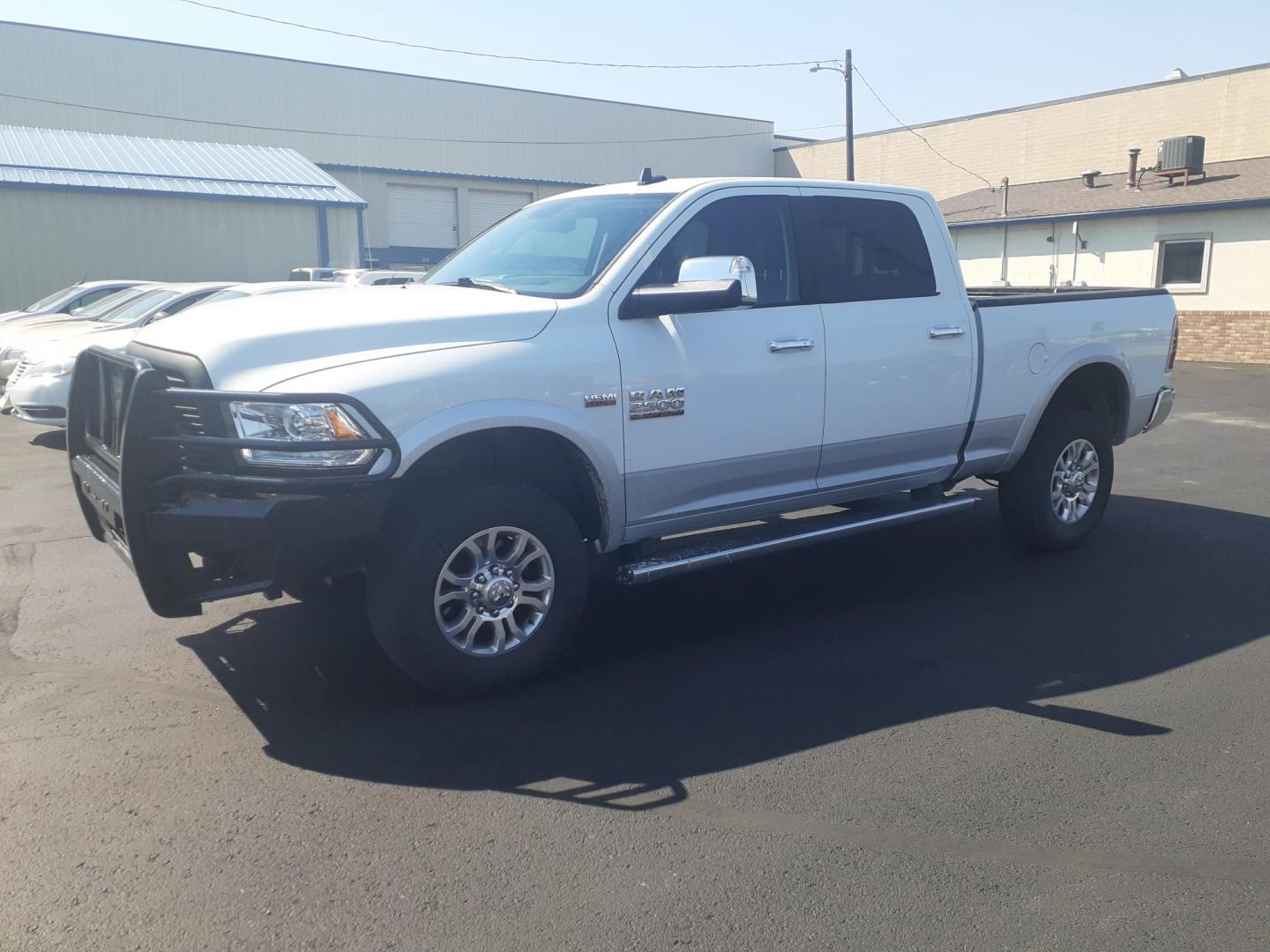 2017 RAM 2500 Laramie Crew Cab SWB 4WD (3C6UR5FJ7HG) with an 6.4L V8 engine, 6A transmission, located at 2015 Cambell Street, Rapid City, SD, 57701, (605) 342-8326, 44.066433, -103.191772 - CARFAX AVAILABLE - Photo#1