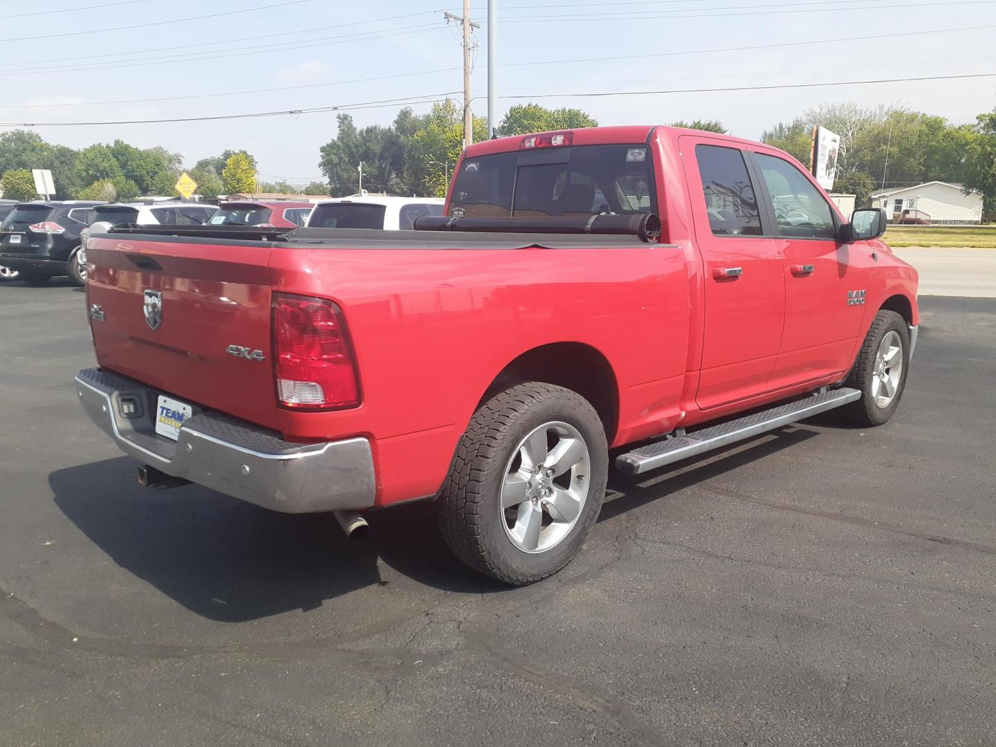 2015 RAM 1500 SLT Quad Cab 4WD (1C6RR7GG7FS) with an 3.6L V6 DOHC 24V FFV engine, 6-Speed Automatic transmission, located at 2015 Cambell Street, Rapid City, SD, 57701, (605) 342-8326, 44.066433, -103.191772 - CARFAX AVAILABLE - Photo#3