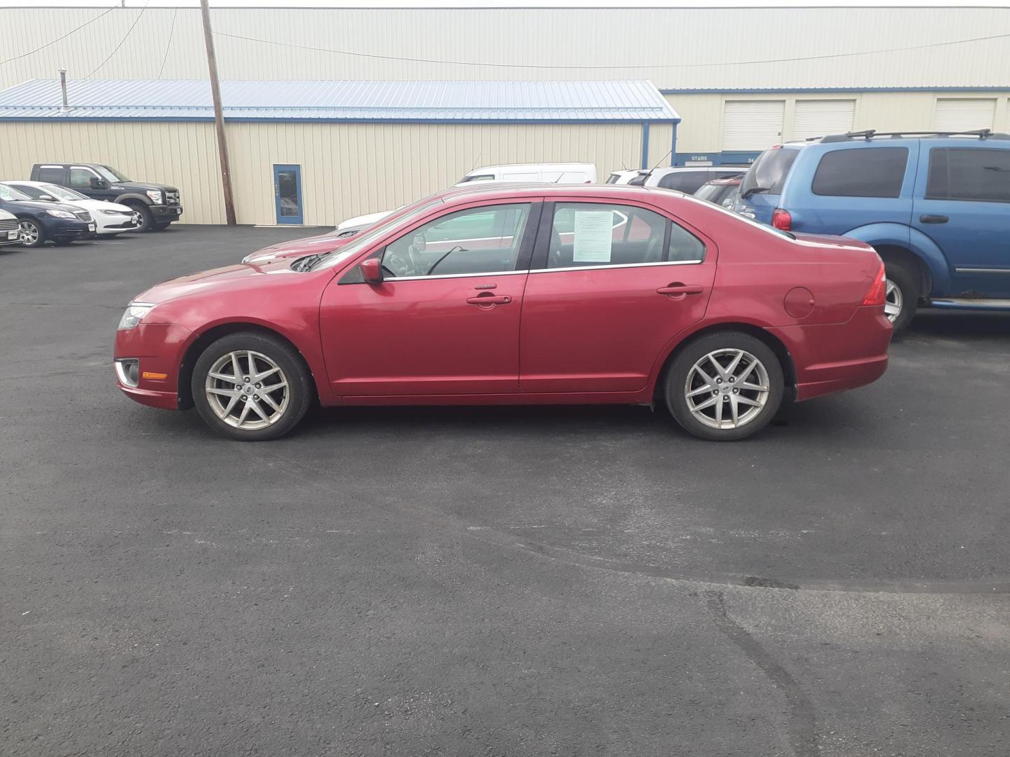 2011 Ford Fusion V6 SEL (3FAHP0JG1BR) with an 3.0L V6 DOHC 24V engine, located at 2015 Cambell Street, Rapid City, SD, 57701, (605) 342-8326, 44.066433, -103.191772 - Photo#0