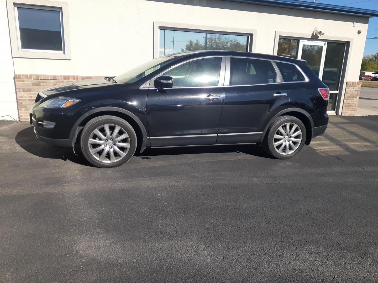 2009 Mazda CX-9 Grand Touring AWD (JM3TB38A590) with an 3.7L V6 DOHC 24V engine, 6-Speed Automatic transmission, located at 2015 Cambell Street, Rapid City, SD, 57701, (605) 342-8326, 44.066433, -103.191772 - CARFAX AVAILABLE - Photo#1