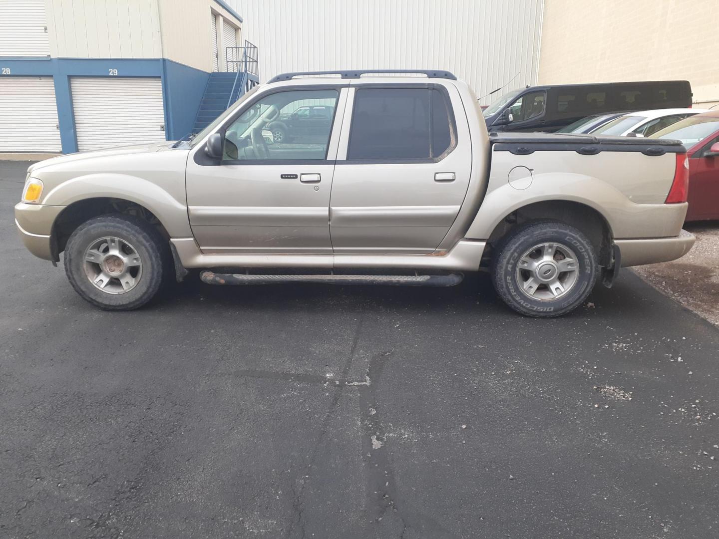 2004 Ford Explorer Sport Trac Adrenalin 4WD (1FMZU77K14U) with an 4.0L V6 SOHC 12V FFV engine, 5-Speed Automatic Overdrive transmission, located at 2015 Cambell Street, Rapid City, SD, 57701, (605) 342-8326, 44.066433, -103.191772 - CARFAX AVAILABLE CASH ONLY VEHICE NO FIANCING AVAILABLE - Photo#0