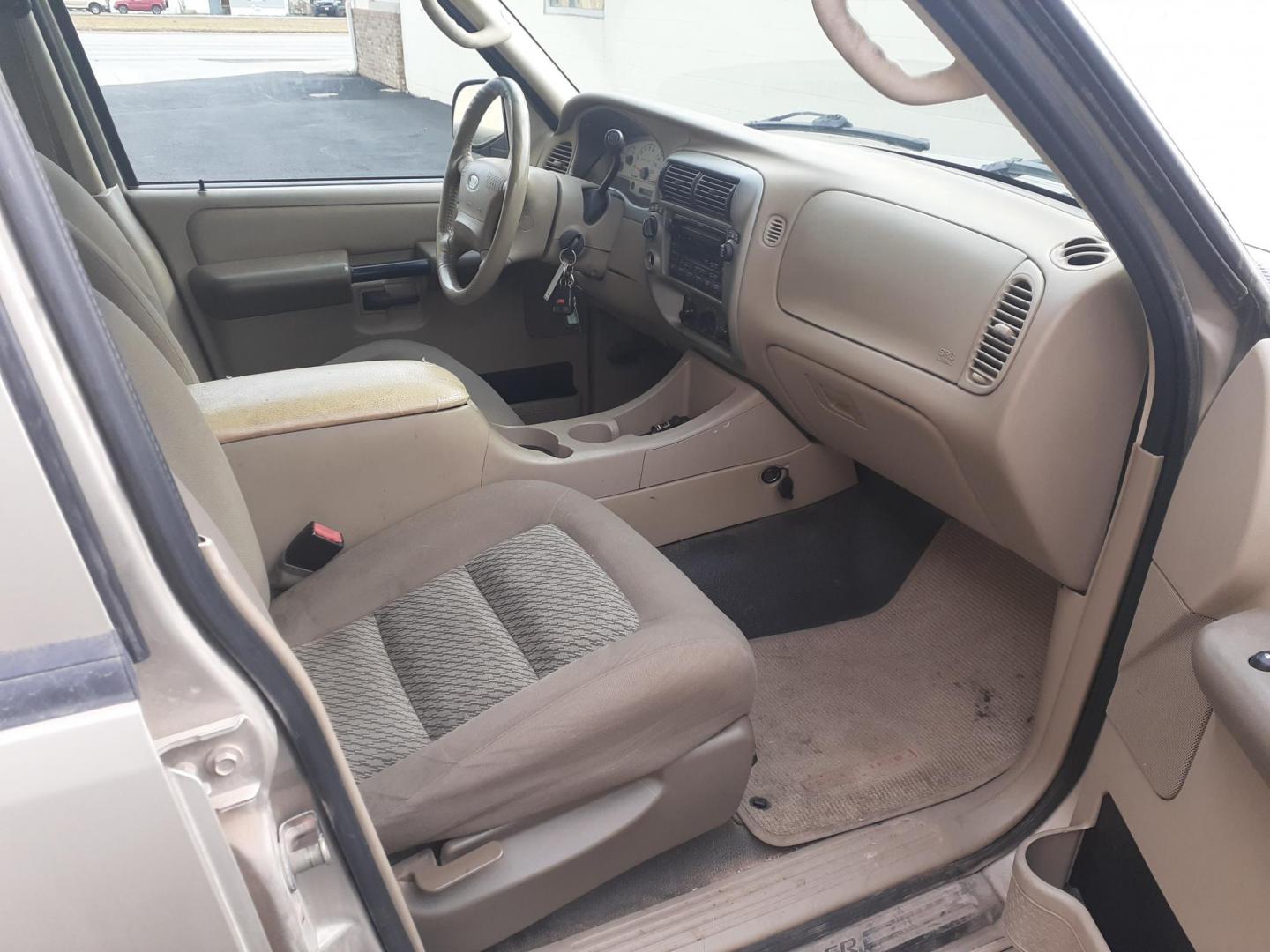 2004 Ford Explorer Sport Trac Adrenalin 4WD (1FMZU77K14U) with an 4.0L V6 SOHC 12V FFV engine, 5-Speed Automatic Overdrive transmission, located at 2015 Cambell Street, Rapid City, SD, 57701, (605) 342-8326, 44.066433, -103.191772 - CARFAX AVAILABLE CASH ONLY VEHICE NO FIANCING AVAILABLE - Photo#2