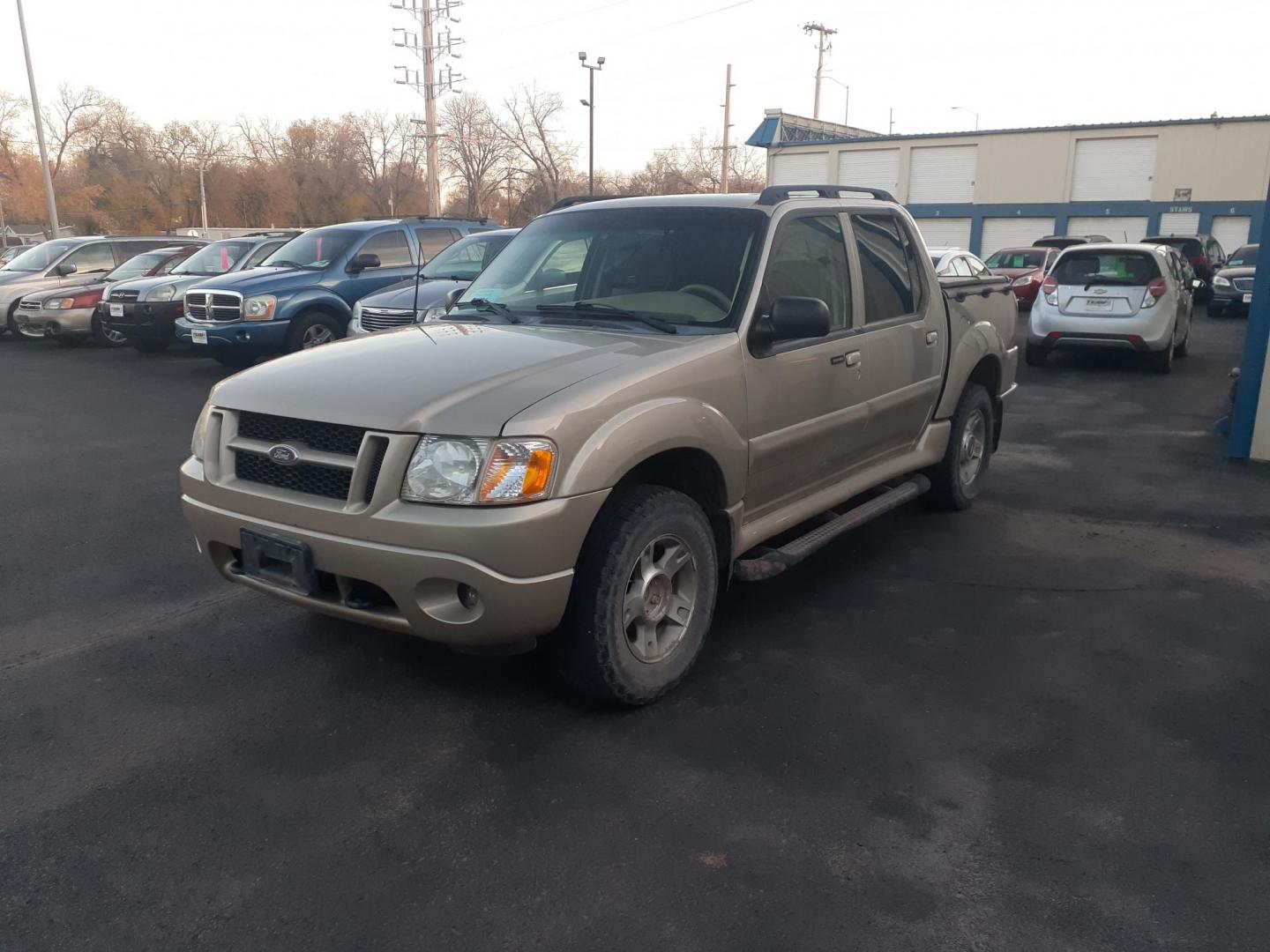 2004 Ford Explorer Sport Trac Adrenalin 4WD (1FMZU77K14U) with an 4.0L V6 SOHC 12V FFV engine, 5-Speed Automatic Overdrive transmission, located at 2015 Cambell Street, Rapid City, SD, 57701, (605) 342-8326, 44.066433, -103.191772 - CARFAX AVAILABLE CASH ONLY VEHICE NO FIANCING AVAILABLE - Photo#4