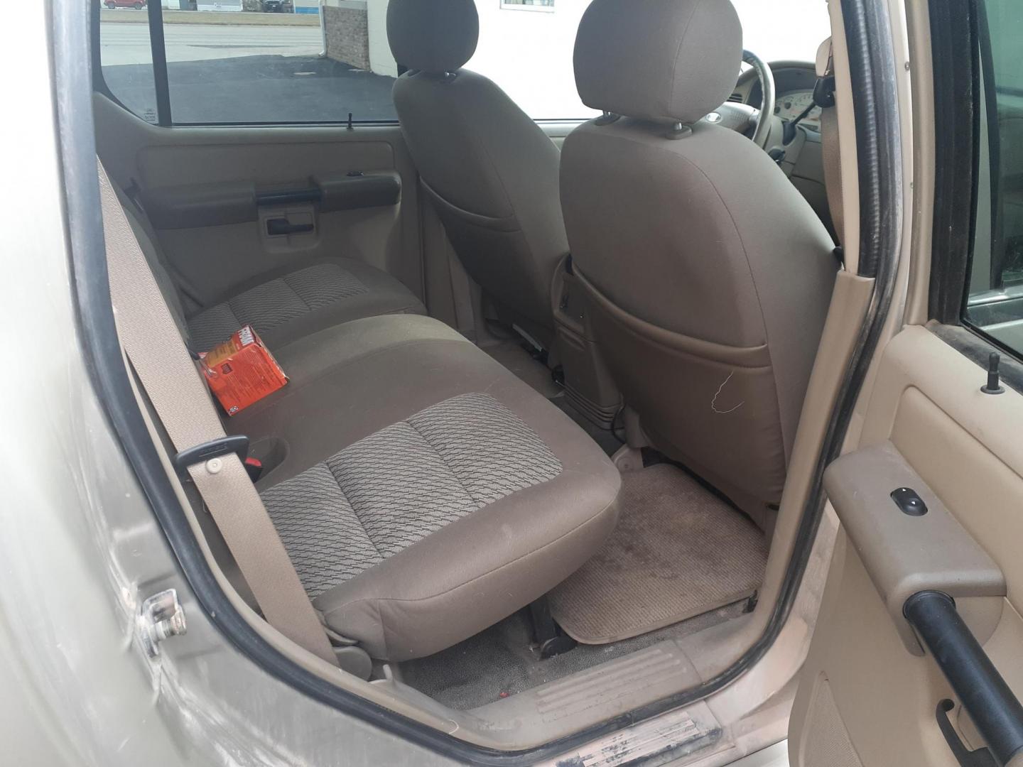 2004 Ford Explorer Sport Trac Adrenalin 4WD (1FMZU77K14U) with an 4.0L V6 SOHC 12V FFV engine, 5-Speed Automatic Overdrive transmission, located at 2015 Cambell Street, Rapid City, SD, 57701, (605) 342-8326, 44.066433, -103.191772 - CARFAX AVAILABLE CASH ONLY VEHICE NO FIANCING AVAILABLE - Photo#3