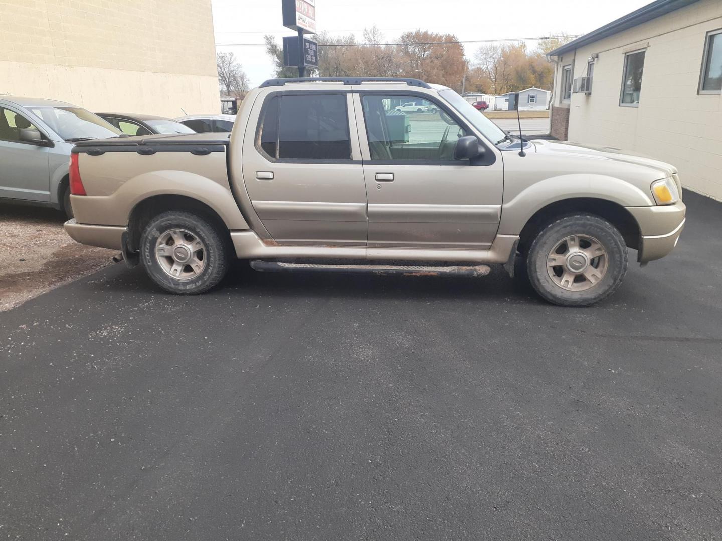 2004 Ford Explorer Sport Trac Adrenalin 4WD (1FMZU77K14U) with an 4.0L V6 SOHC 12V FFV engine, 5-Speed Automatic Overdrive transmission, located at 2015 Cambell Street, Rapid City, SD, 57701, (605) 342-8326, 44.066433, -103.191772 - CARFAX AVAILABLE CASH ONLY VEHICE NO FIANCING AVAILABLE - Photo#1