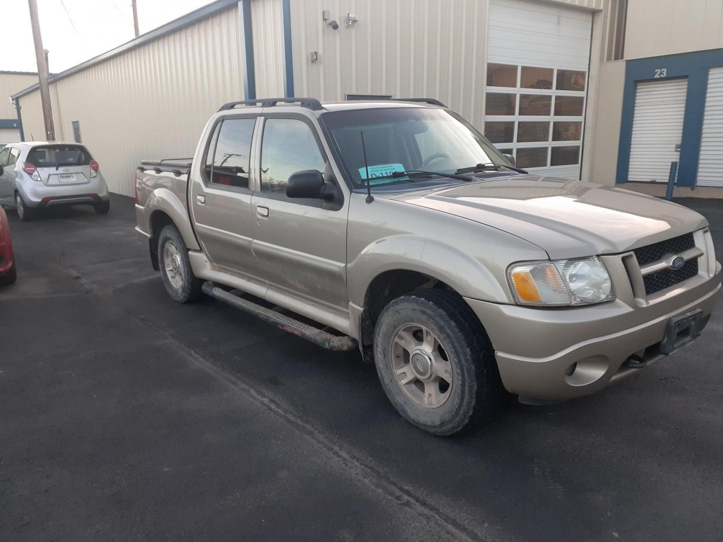 2004 Ford Explorer Sport Trac Adrenalin 4WD (1FMZU77K14U) with an 4.0L V6 SOHC 12V FFV engine, 5-Speed Automatic Overdrive transmission, located at 2015 Cambell Street, Rapid City, SD, 57701, (605) 342-8326, 44.066433, -103.191772 - CARFAX AVAILABLE CASH ONLY VEHICE NO FIANCING AVAILABLE - Photo#5