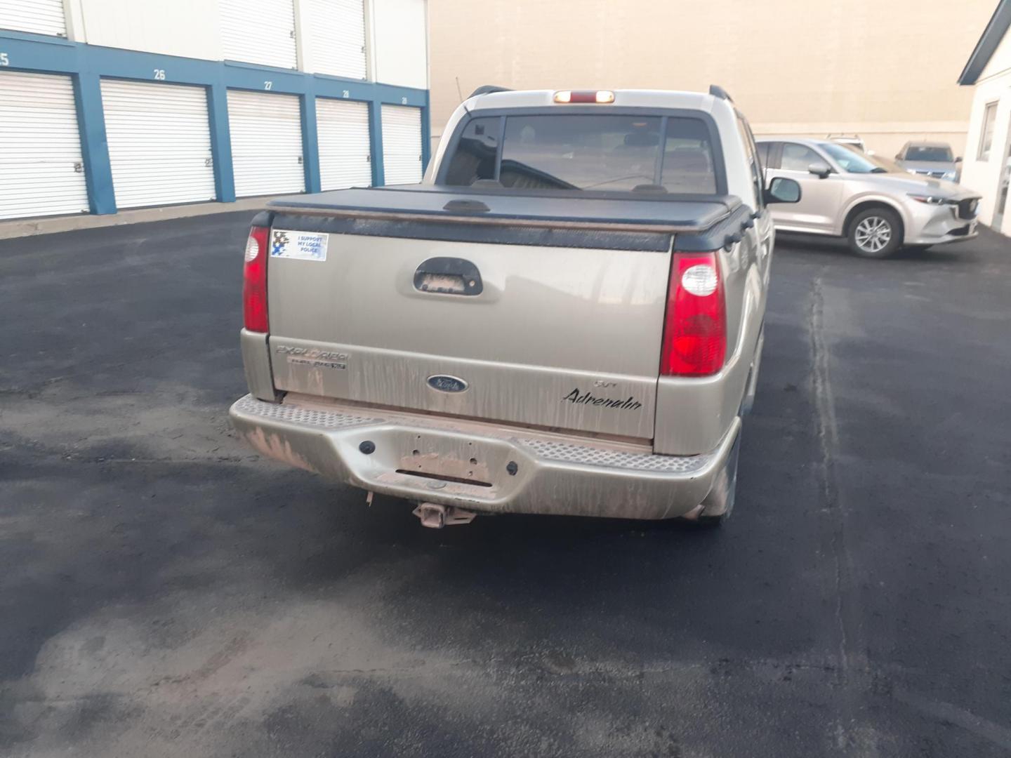 2004 Ford Explorer Sport Trac Adrenalin 4WD (1FMZU77K14U) with an 4.0L V6 SOHC 12V FFV engine, 5-Speed Automatic Overdrive transmission, located at 2015 Cambell Street, Rapid City, SD, 57701, (605) 342-8326, 44.066433, -103.191772 - CARFAX AVAILABLE CASH ONLY VEHICE NO FIANCING AVAILABLE - Photo#6