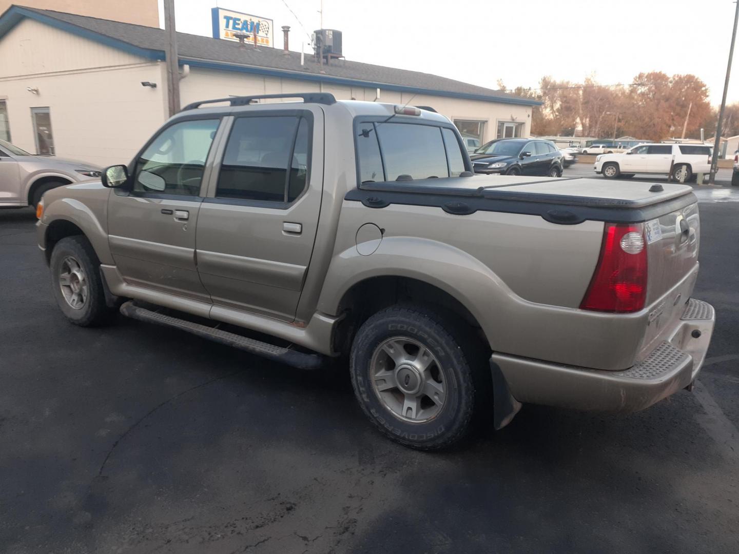 2004 Ford Explorer Sport Trac Adrenalin 4WD (1FMZU77K14U) with an 4.0L V6 SOHC 12V FFV engine, 5-Speed Automatic Overdrive transmission, located at 2015 Cambell Street, Rapid City, SD, 57701, (605) 342-8326, 44.066433, -103.191772 - CARFAX AVAILABLE CASH ONLY VEHICE NO FIANCING AVAILABLE - Photo#7