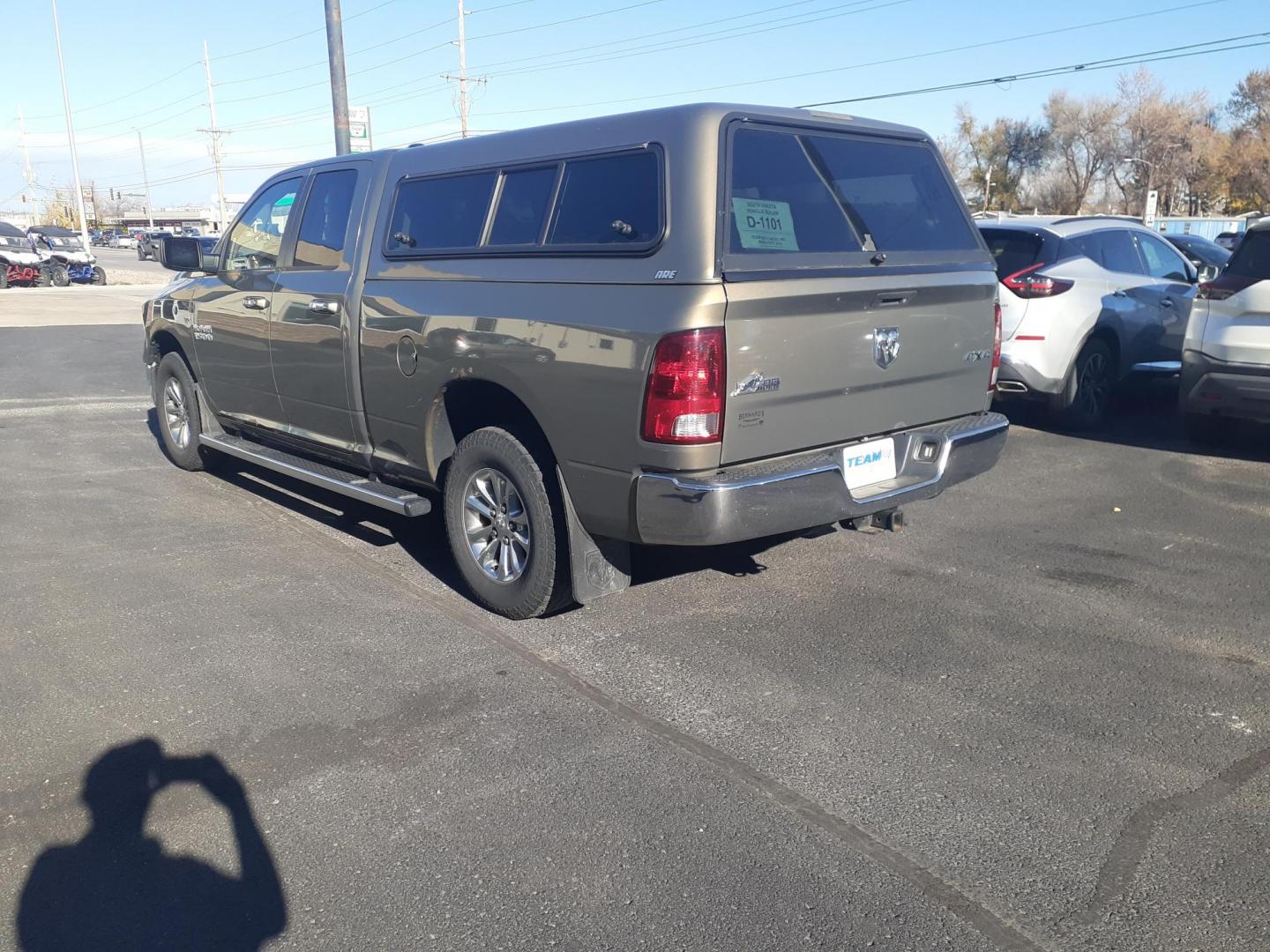 2013 RAM 1500 SLT Quad Cab 4WD (1C6RR7GG9DS) with an 3.6L V6 DOHC 24V FFV engine, 6-Speed Automatic transmission, located at 2015 Cambell Street, Rapid City, SD, 57701, (605) 342-8326, 44.066433, -103.191772 - CARFAX AVAILABLE - Photo#2