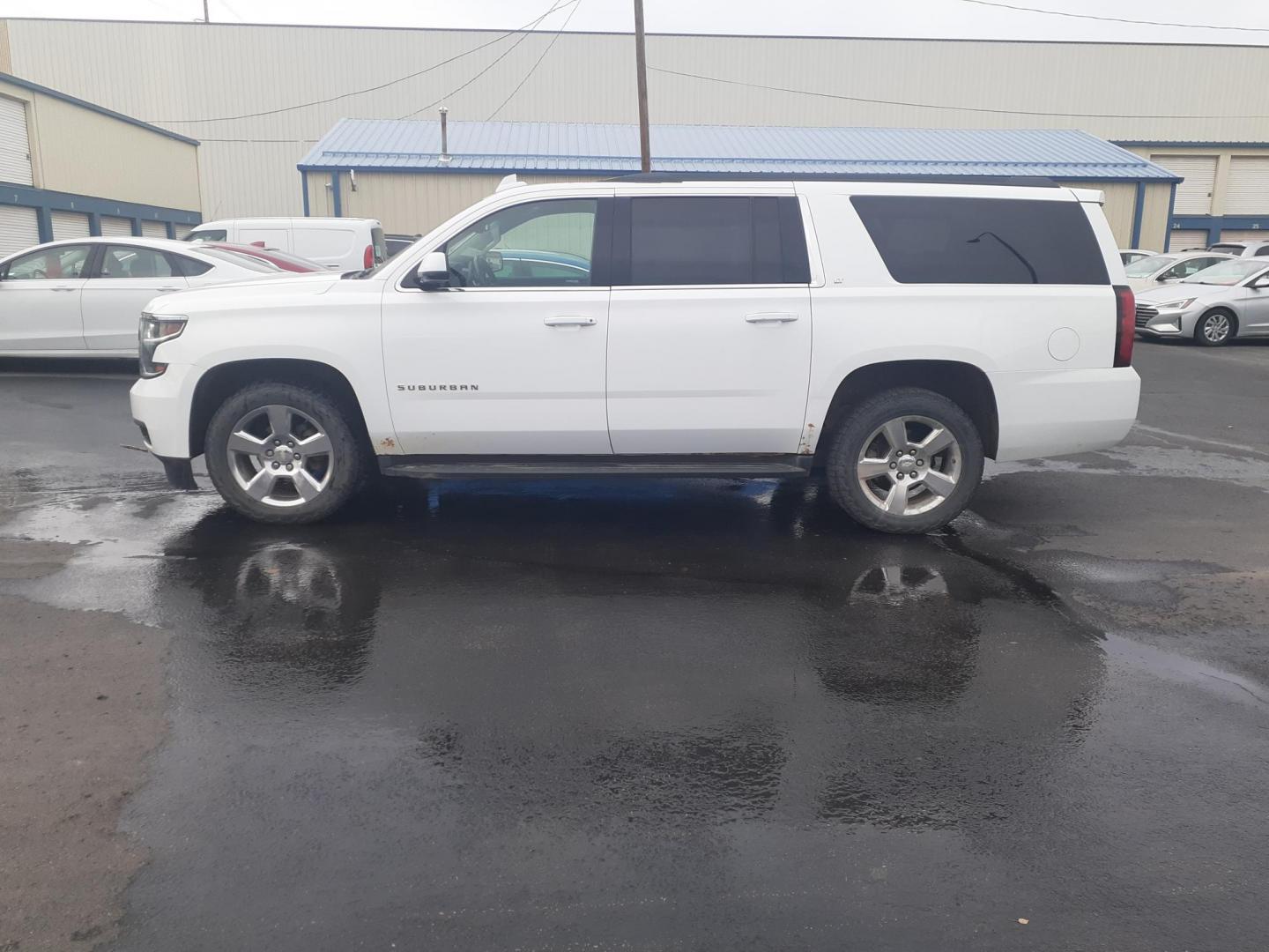 2017 Chevrolet Suburban LT 4WD (1GNSKHKC0HR) with an 5.3L V8 OHV 16V engine, 6A transmission, located at 2015 Cambell Street, Rapid City, SD, 57701, (605) 342-8326, 44.066433, -103.191772 - CARFAX AVAILABLE - Photo#0