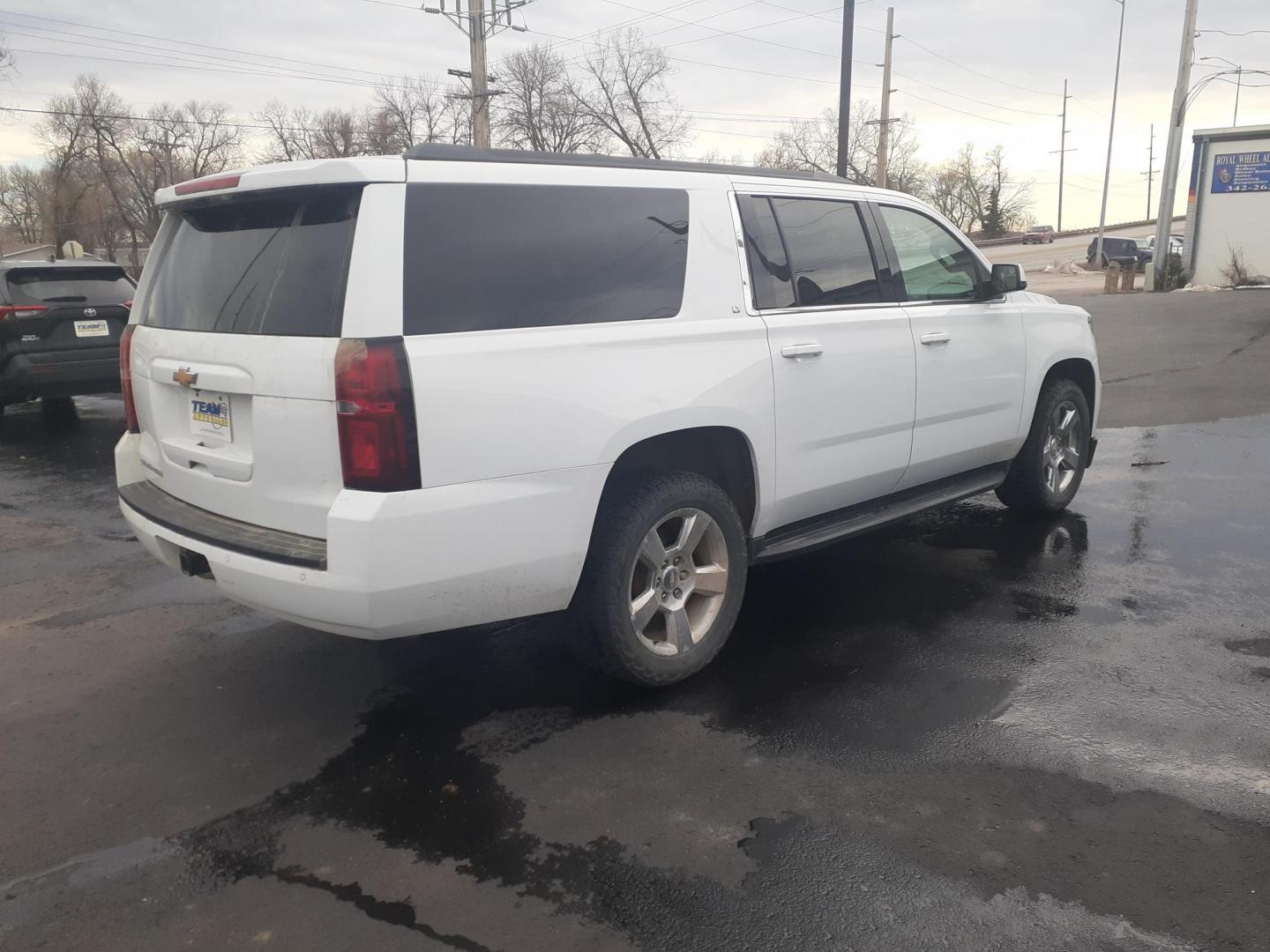 2017 Chevrolet Suburban LT 4WD (1GNSKHKC0HR) with an 5.3L V8 OHV 16V engine, 6A transmission, located at 2015 Cambell Street, Rapid City, SD, 57701, (605) 342-8326, 44.066433, -103.191772 - CARFAX AVAILABLE - Photo#3