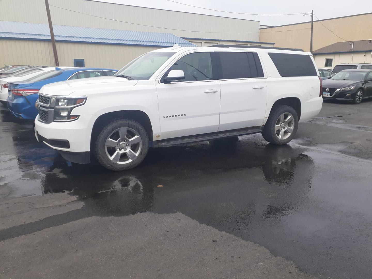 2017 Chevrolet Suburban LT 4WD (1GNSKHKC0HR) with an 5.3L V8 OHV 16V engine, 6A transmission, located at 2015 Cambell Street, Rapid City, SD, 57701, (605) 342-8326, 44.066433, -103.191772 - CARFAX AVAILABLE - Photo#1