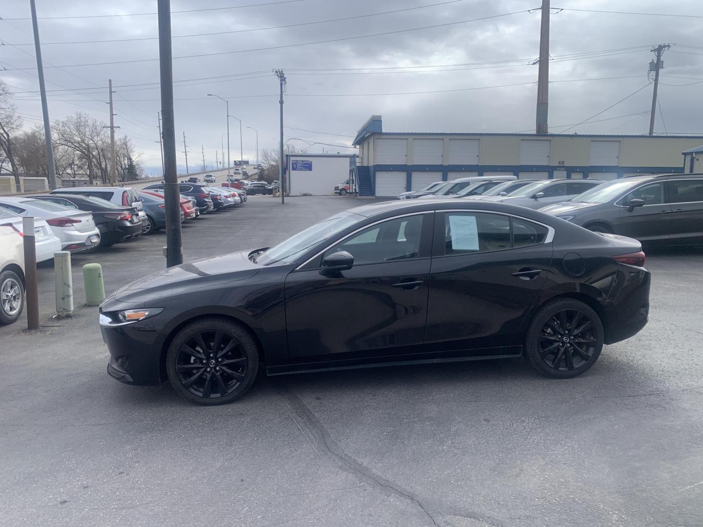 2024 Mazda MAZDA3 Select (3MZBPABM0RM) with an 2.5L L4 DOHC 16V engine, 6A transmission, located at 2015 Cambell Street, Rapid City, SD, 57701, (605) 342-8326, 44.066433, -103.191772 - Photo#2