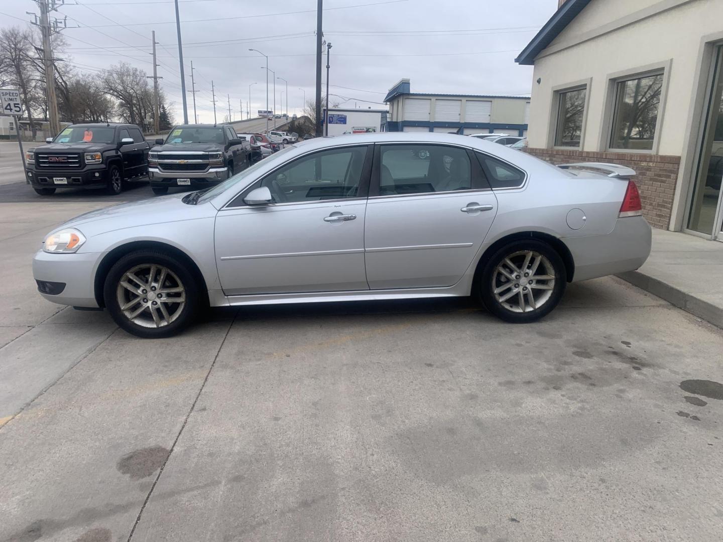 2012 Chevrolet Impala LTZ (2G1WC5E35C1) with an 3.6L V6 DOHC 16V FFV engine, 6-Speed Automatic transmission, located at 2015 Cambell Street, Rapid City, SD, 57701, (605) 342-8326, 44.066433, -103.191772 - Photo#2