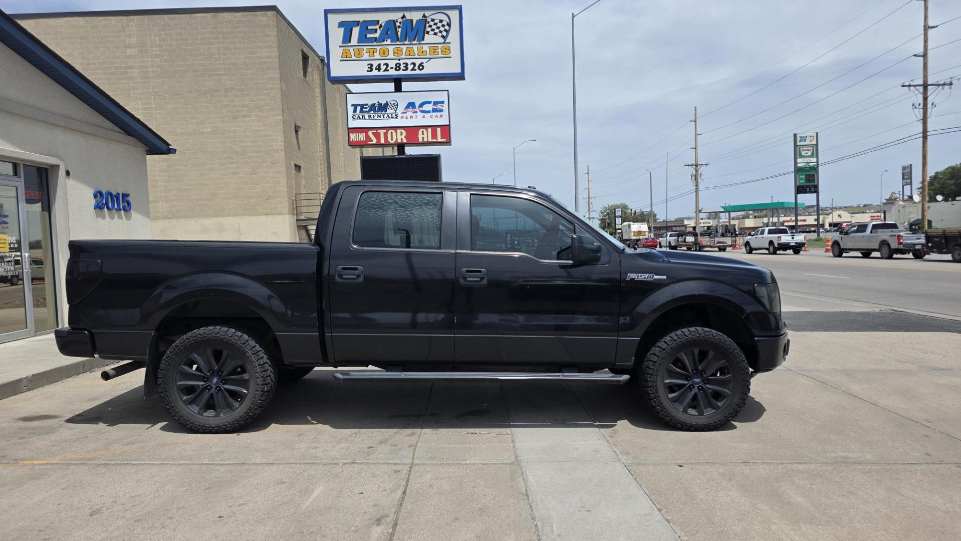 2014 black Ford F-150 XL SuperCrew 5.5-ft. Bed 4WD (1FTFW1EFXEK) with an 5.0L V8 engine, 6-Speed Automatic transmission, located at 2015 Cambell Street, Rapid City, SD, 57701, (605) 342-8326, 44.066433, -103.191772- Photo#0