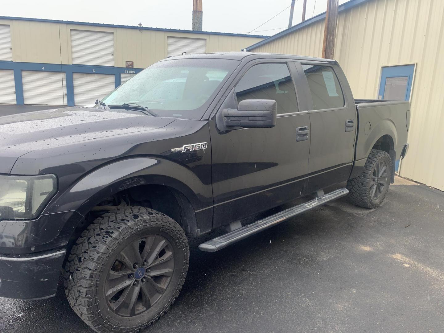 2014 black Ford F-150 XL SuperCrew 5.5-ft. Bed 4WD (1FTFW1EFXEK) with an 5.0L V8 engine, 6-Speed Automatic transmission, located at 2015 Cambell Street, Rapid City, SD, 57701, (605) 342-8326, 44.066433, -103.191772 - Photo#0