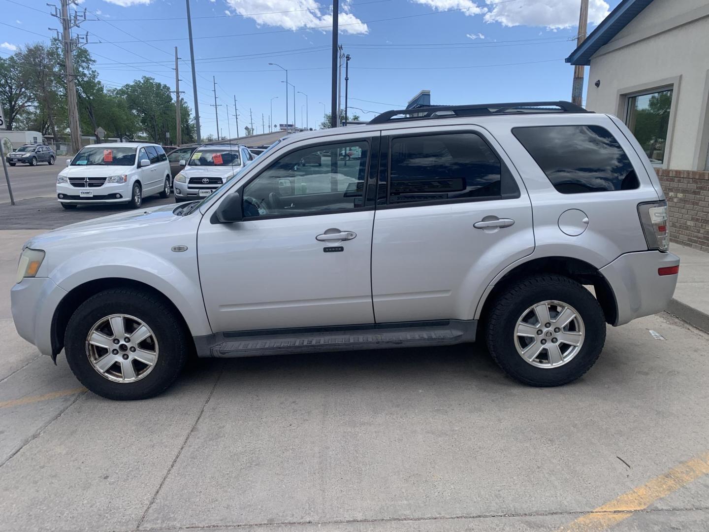 2009 Mercury Mariner I4 2WD (4M2CU81779K) with an 2.5L L4 DOHC 16V engine, 6-Speed Automatic transmission, located at 2015 Cambell Street, Rapid City, SD, 57701, (605) 342-8326, 44.066433, -103.191772 - arriving soon - Photo#2