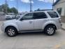 2009 Mercury Mariner I4 2WD (4M2CU81779K) with an 2.5L L4 DOHC 16V engine, 6-Speed Automatic transmission, located at 2015 Cambell Street, Rapid City, SD, 57701, (605) 342-8326, 44.066433, -103.191772 - arriving soon - Photo#2