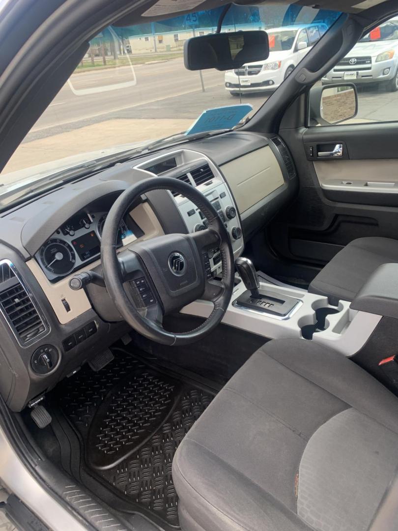 2009 Mercury Mariner I4 2WD (4M2CU81779K) with an 2.5L L4 DOHC 16V engine, 6-Speed Automatic transmission, located at 2015 Cambell Street, Rapid City, SD, 57701, (605) 342-8326, 44.066433, -103.191772 - arriving soon - Photo#4