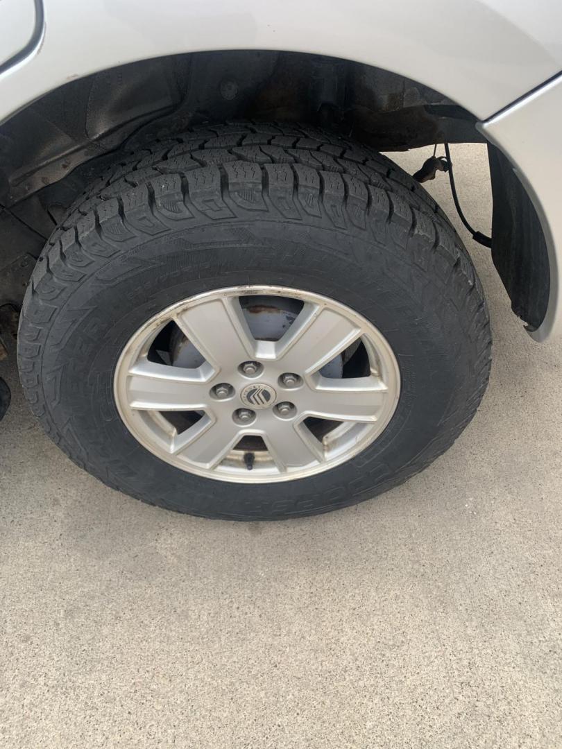 2009 Mercury Mariner I4 2WD (4M2CU81779K) with an 2.5L L4 DOHC 16V engine, 6-Speed Automatic transmission, located at 2015 Cambell Street, Rapid City, SD, 57701, (605) 342-8326, 44.066433, -103.191772 - arriving soon - Photo#6