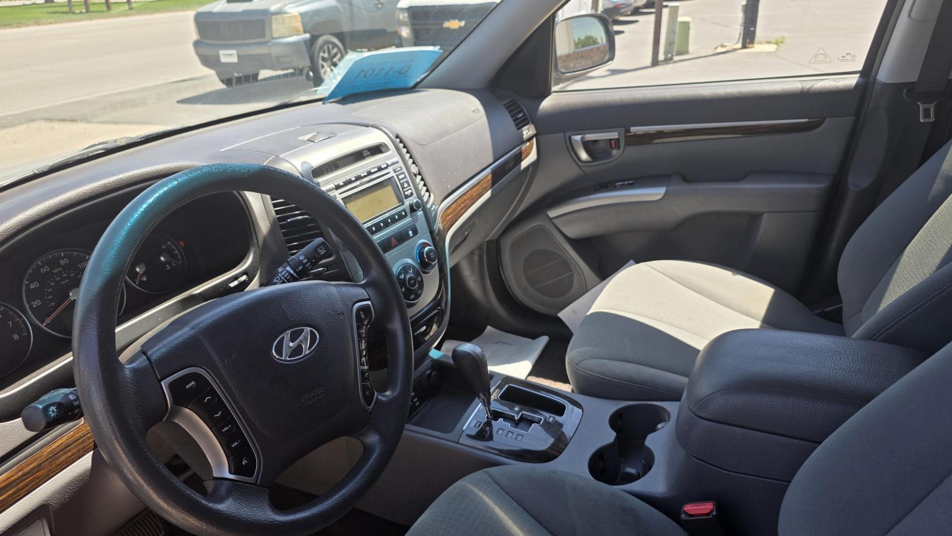 2010 Hyundai Santa Fe GLS 2.4 FWD (5NMSG3AB7AH) with an 2.4L L4 DOHC 16V engine, 6-Speed Automatic transmission, located at 2015 Cambell Street, Rapid City, SD, 57701, (605) 342-8326, 44.066433, -103.191772 - Photo#4