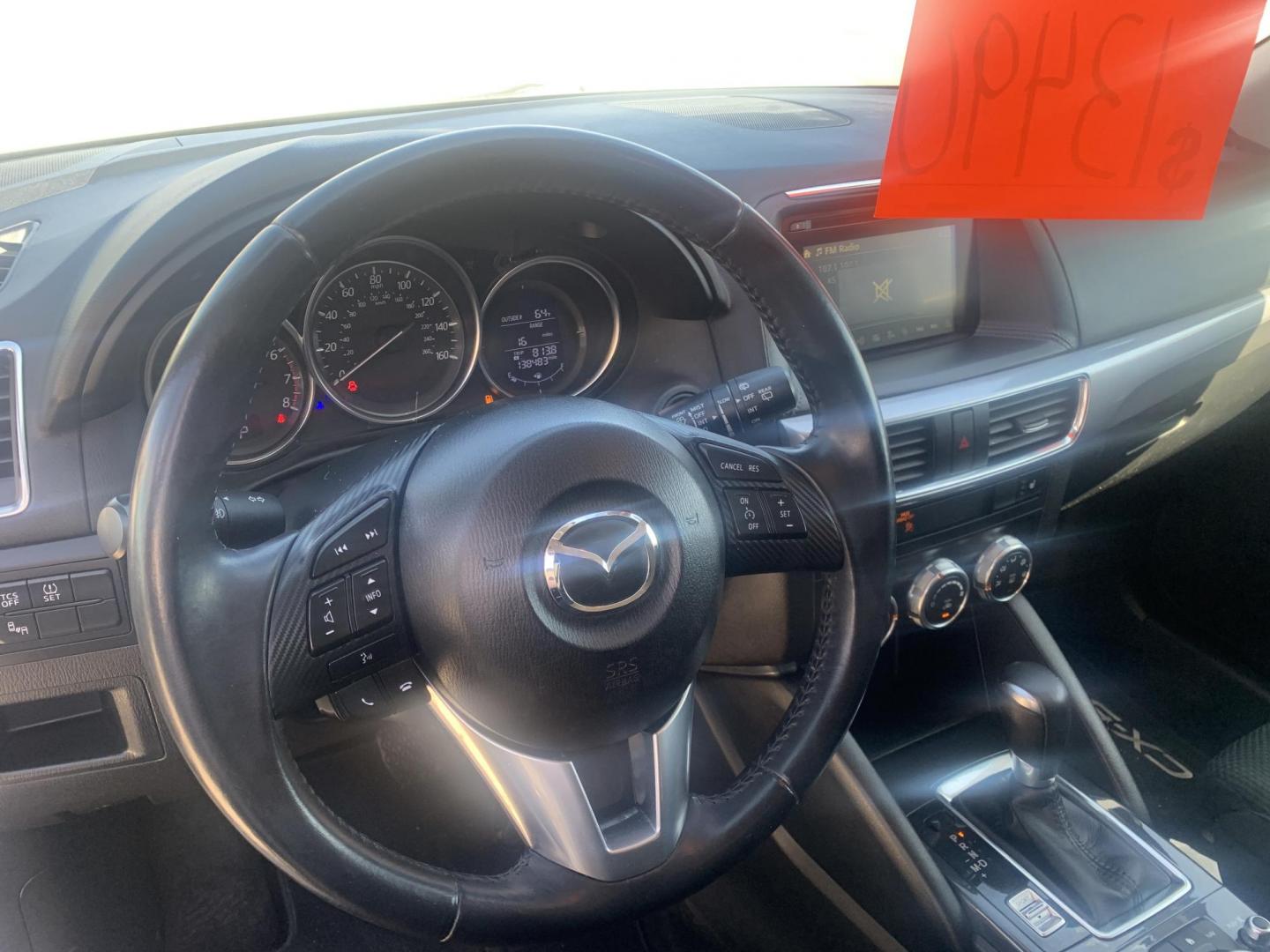 2016 Mazda CX-5 Touring AWD (JM3KE4CY9G0) with an 2.5L L4 DOHC 16V engine, 6-Speed Automatic transmission, located at 2015 Cambell Street, Rapid City, SD, 57701, (605) 342-8326, 44.066433, -103.191772 - Photo#5