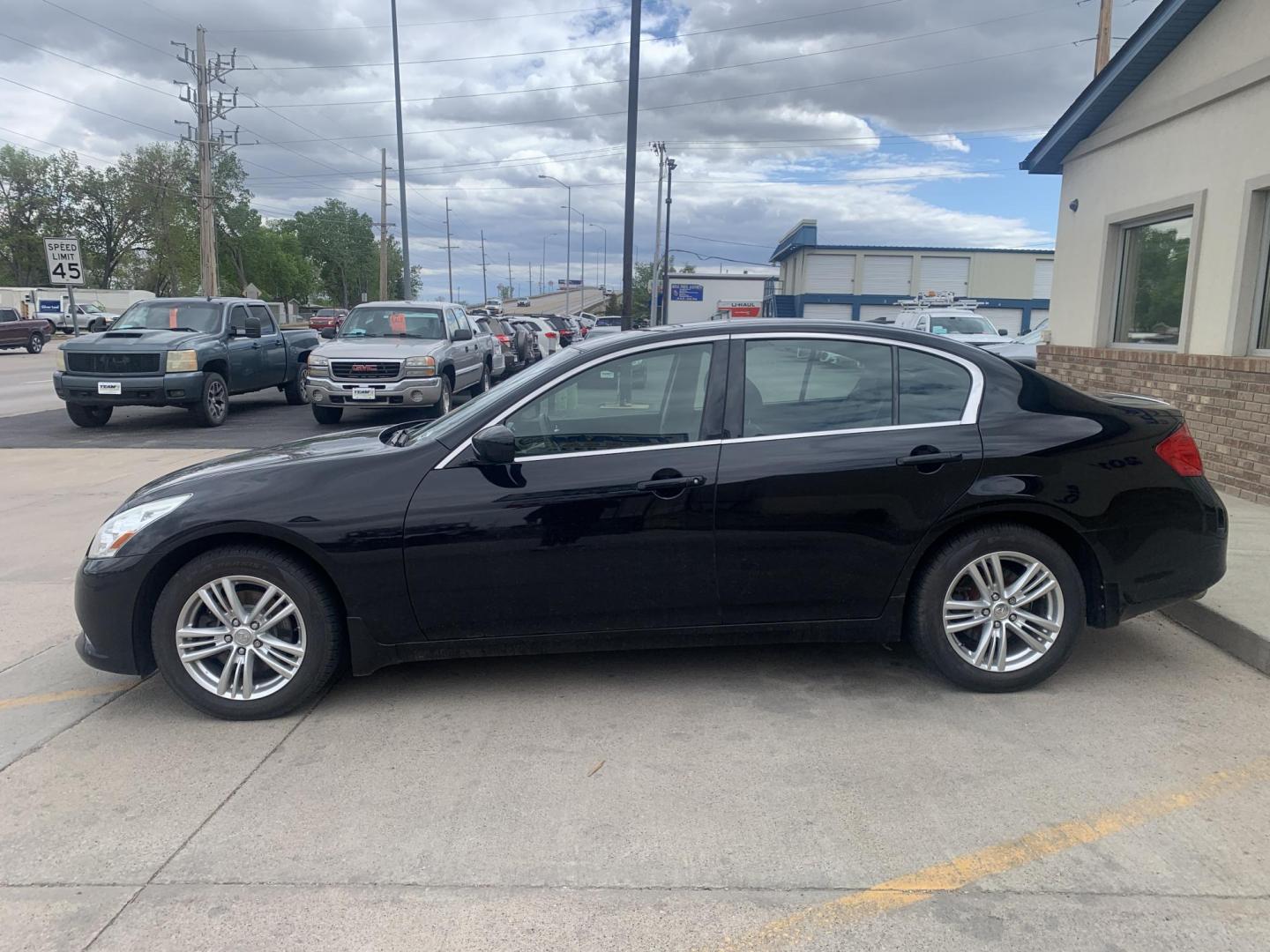 2012 Infiniti G Sedan 37x AWD (JN1CV6AR4CM) with an 3.7L V6 DOHC 24V engine, 5-Speed Automatic transmission, located at 2015 Cambell Street, Rapid City, SD, 57701, (605) 342-8326, 44.066433, -103.191772 - Luxury with AWD - Photo#2