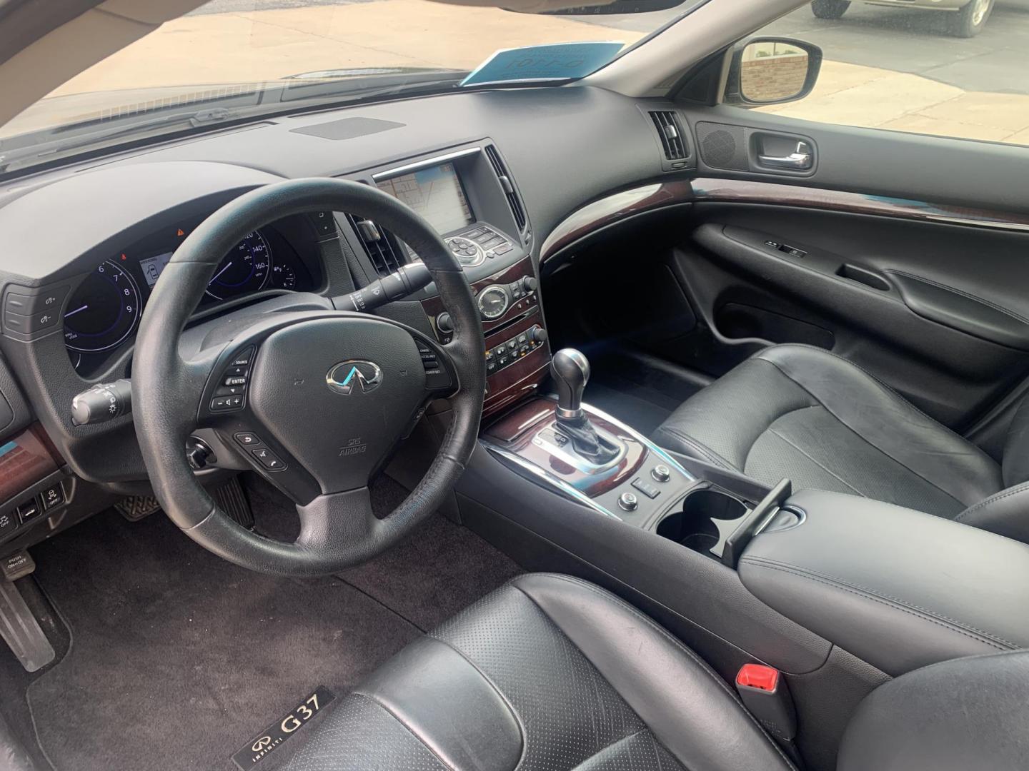 2012 Infiniti G Sedan 37x AWD (JN1CV6AR4CM) with an 3.7L V6 DOHC 24V engine, 5-Speed Automatic transmission, located at 2015 Cambell Street, Rapid City, SD, 57701, (605) 342-8326, 44.066433, -103.191772 - Luxury with AWD - Photo#4
