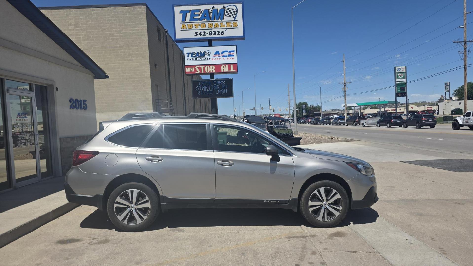 2018 Subaru Outback 3.6R Limited (4S4BSENC5J3) with an 3.6L H6 DOHC 24V engine, CVT transmission, located at 2015 Cambell Street, Rapid City, SD, 57701, (605) 342-8326, 44.066433, -103.191772 - Photo#0