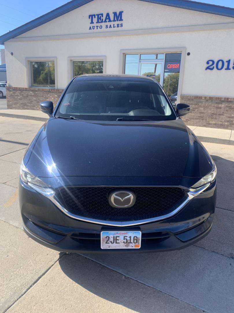 2021 Mazda CX-5 Grand Touring AWD (JM3KFBDM3M0) with an 2.5L L4 DOHC 16V engine, 6A transmission, located at 2015 Cambell Street, Rapid City, SD, 57701, (605) 342-8326, 44.066433, -103.191772- Photo#1