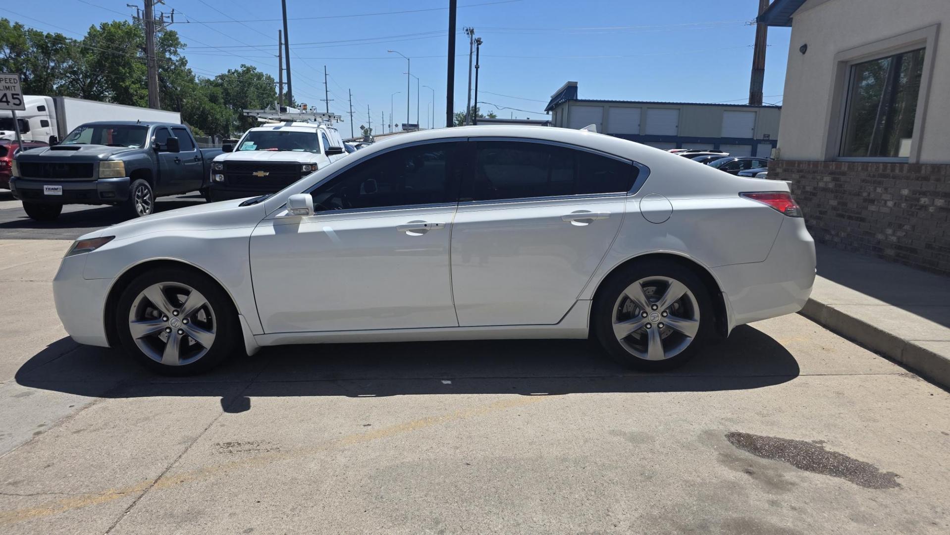 2012 Acura TL 6-Speed AT SH-AWD with Tech Package and HPT (19UUA9F54CA) with an 3.5L V6 SOHC 24V engine, 6-Speed Automatic transmission, located at 2015 Cambell Street, Rapid City, SD, 57701, (605) 342-8326, 44.066433, -103.191772 - NEW ARRIVAL PICTURES COMING SOON AND CAR FAX - Photo#1