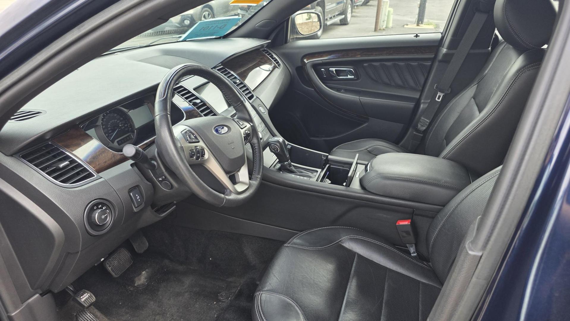 2016 Blue Ford Taurus Limited FWD (1FAHP2F80GG) with an 3.5L V6 DOHC 24V engine, 6A transmission, located at 2015 Cambell Street, Rapid City, SD, 57701, (605) 342-8326, 44.066433, -103.191772 - JUST ARRIVED- Photo#4