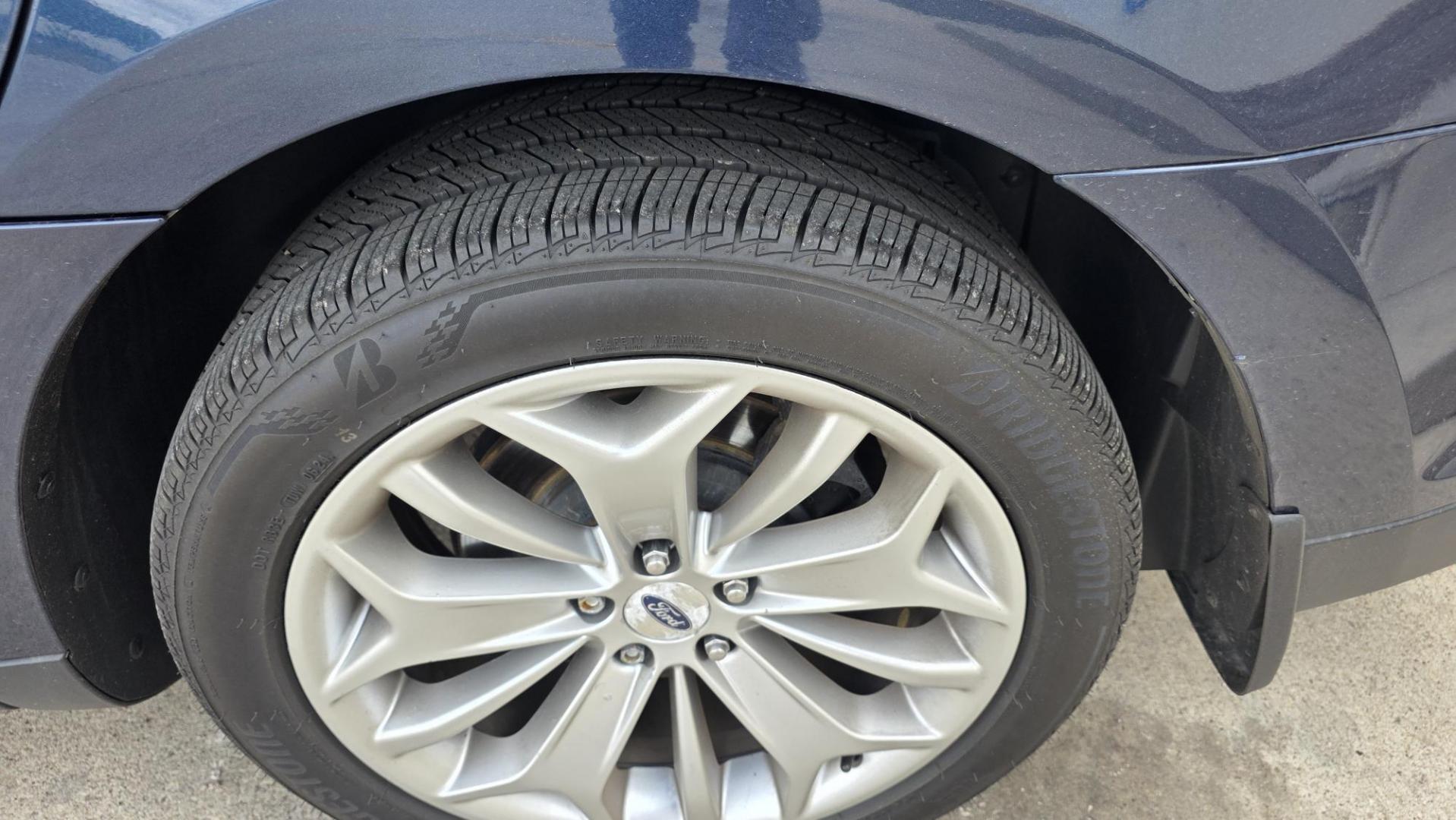2016 Blue Ford Taurus Limited FWD (1FAHP2F80GG) with an 3.5L V6 DOHC 24V engine, 6A transmission, located at 2015 Cambell Street, Rapid City, SD, 57701, (605) 342-8326, 44.066433, -103.191772 - JUST ARRIVED- Photo#5