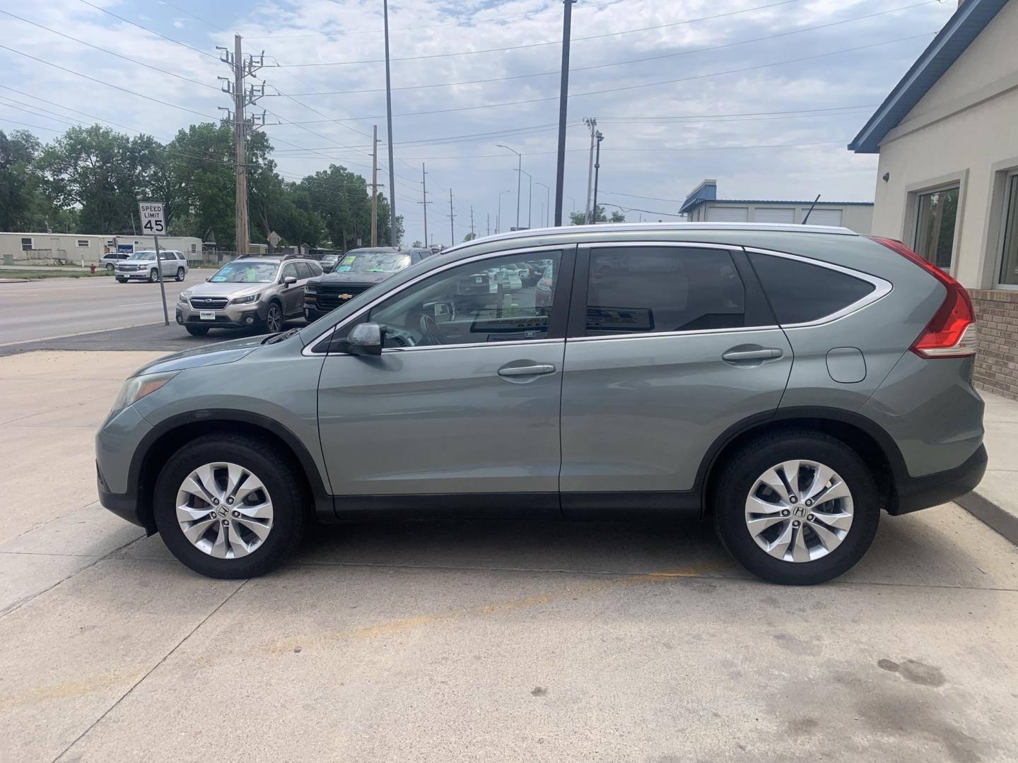 2012 Honda CR-V EX-L 4WD 5-Speed AT (5J6RM4H76CL) with an 2.4L L4 DOHC 16V engine, 5-Speed Automatic transmission, located at 2015 Cambell Street, Rapid City, SD, 57701, (605) 342-8326, 44.066433, -103.191772 - JUST ARRIVED- Photo#2